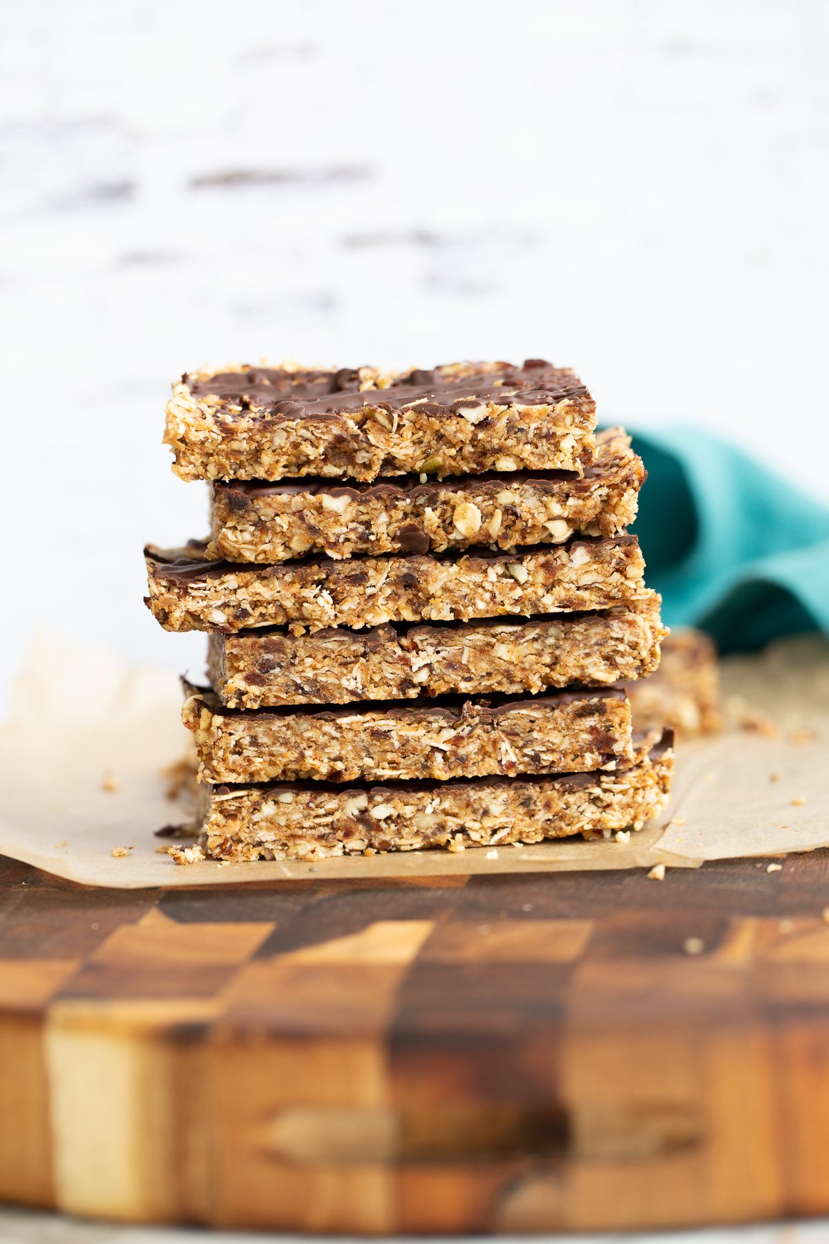 a stack of vegan coconut caramel date bars