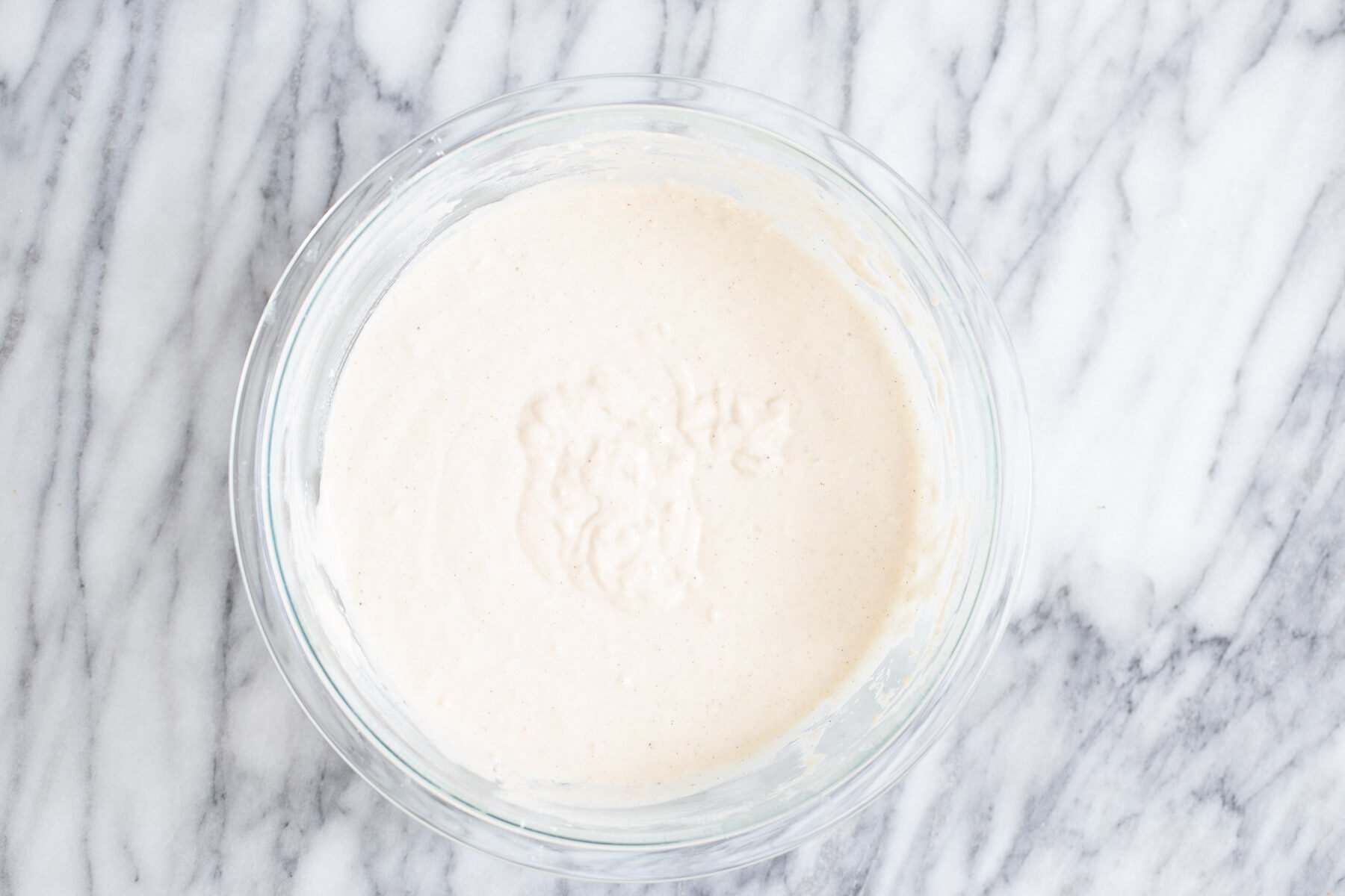 vegan pancake batter in a glass bowl