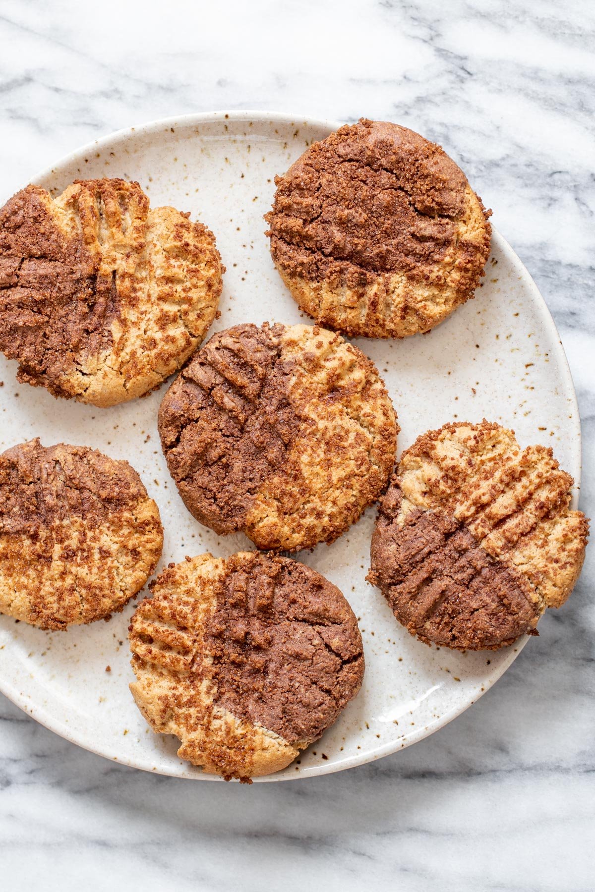 vegan snickerdoodles overhead shot of a plate with vegan pumpkin spice snickerdoodle cookies on a plate