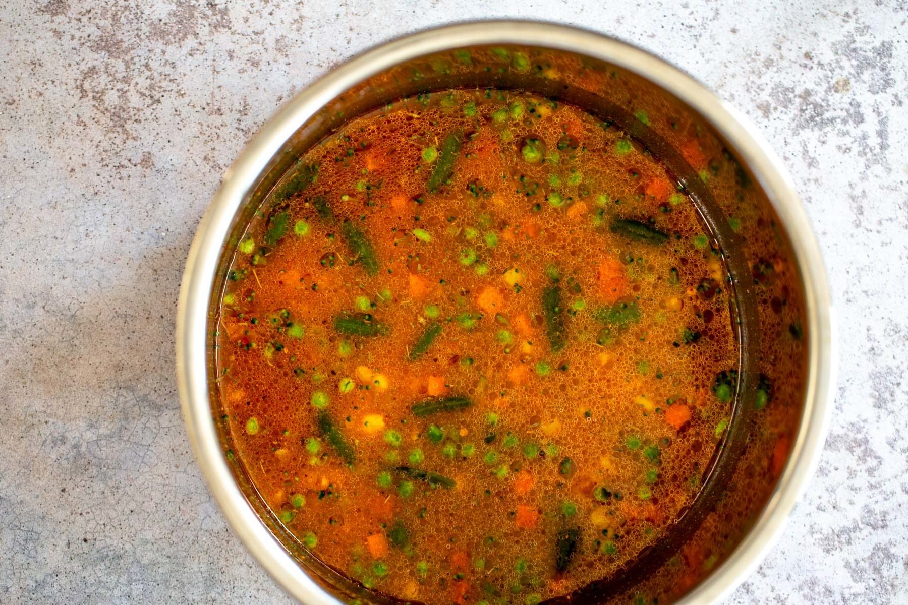 Instant Pot Fried Rice  water being added to dry ingredients used for making Instant Pot Fried Rice