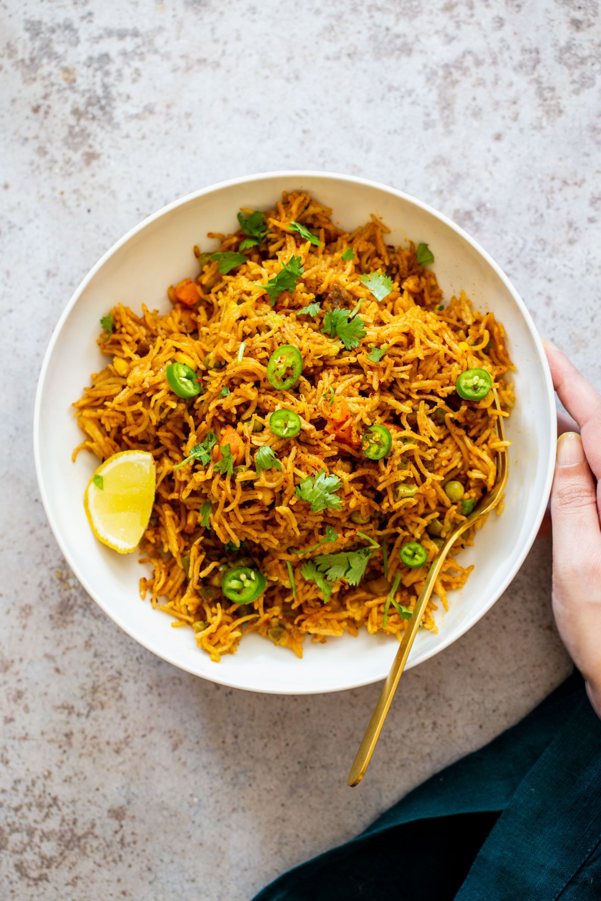 Instant Pot Fried Rice pumpkin fried rice served with sliced of lime and jalapenos