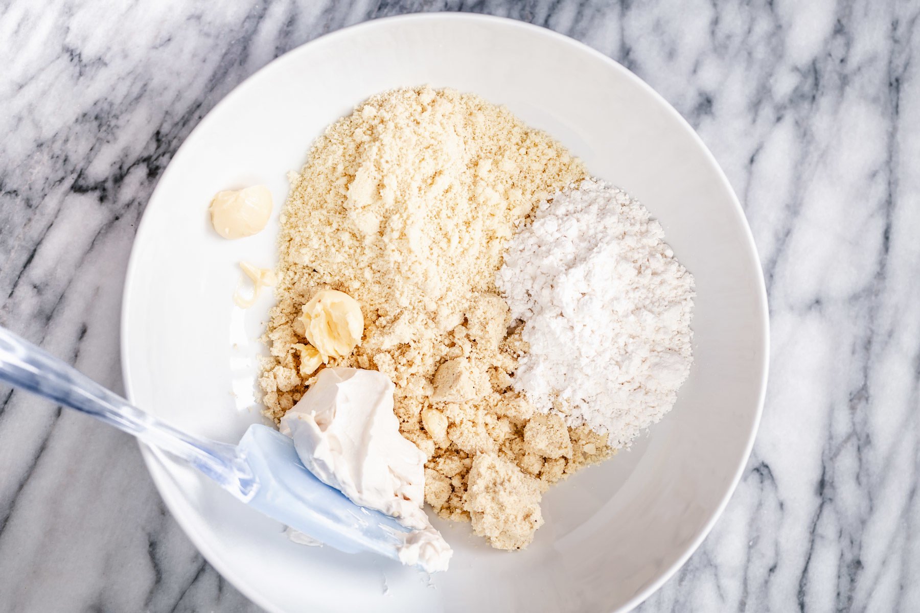 rasmalai cake dry mix for vegan rasmalai cake in a small bowl