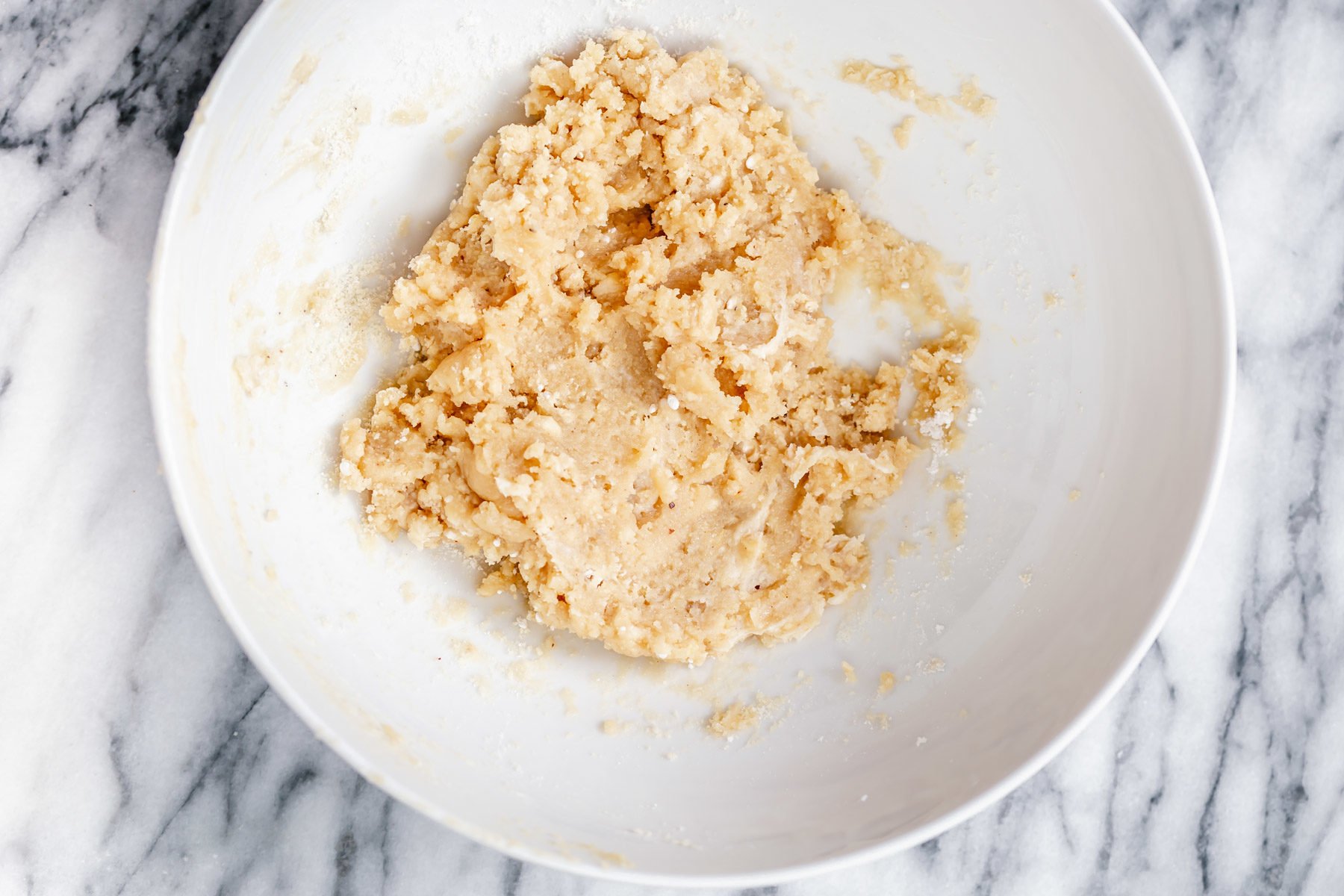 rasmalai cake vegan rasmalai cake batter being combined in a bowl