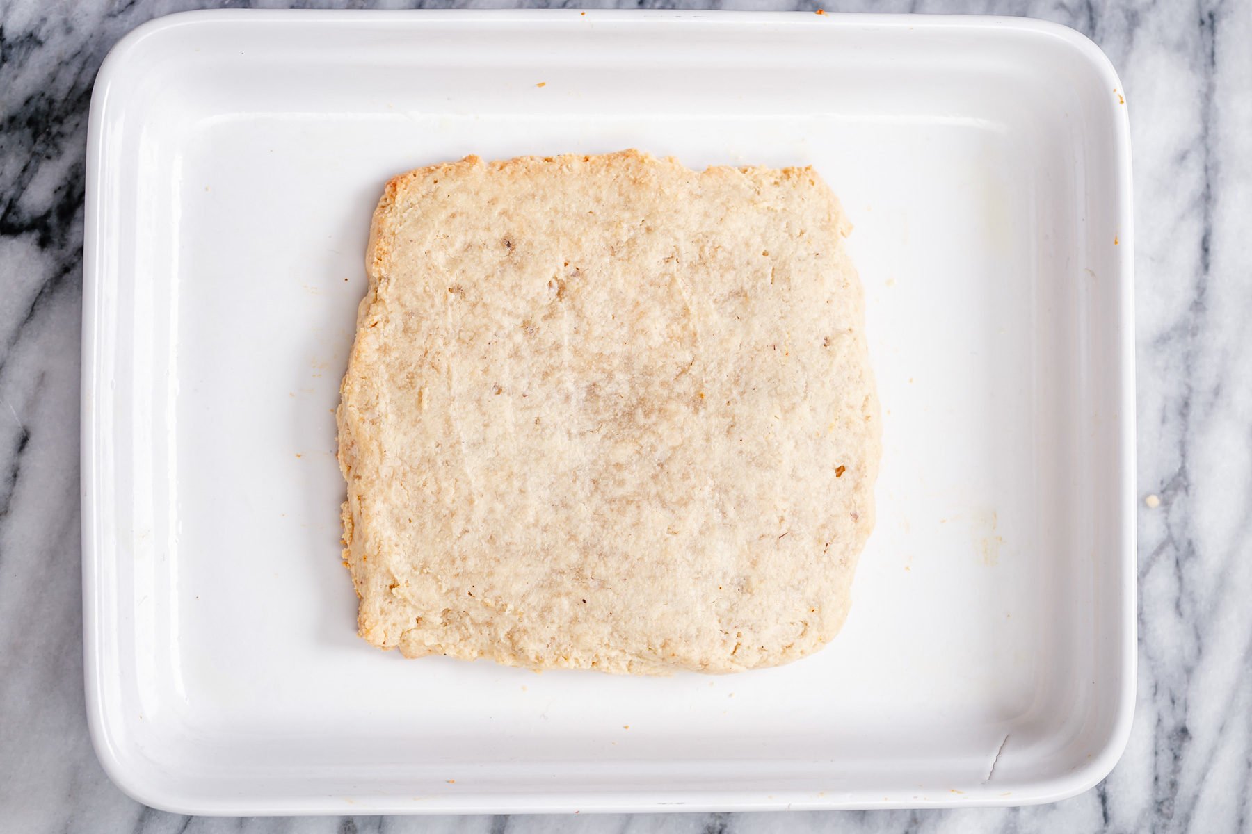 rasmalai cake baked vegan rasmalai cake in a square baking pan