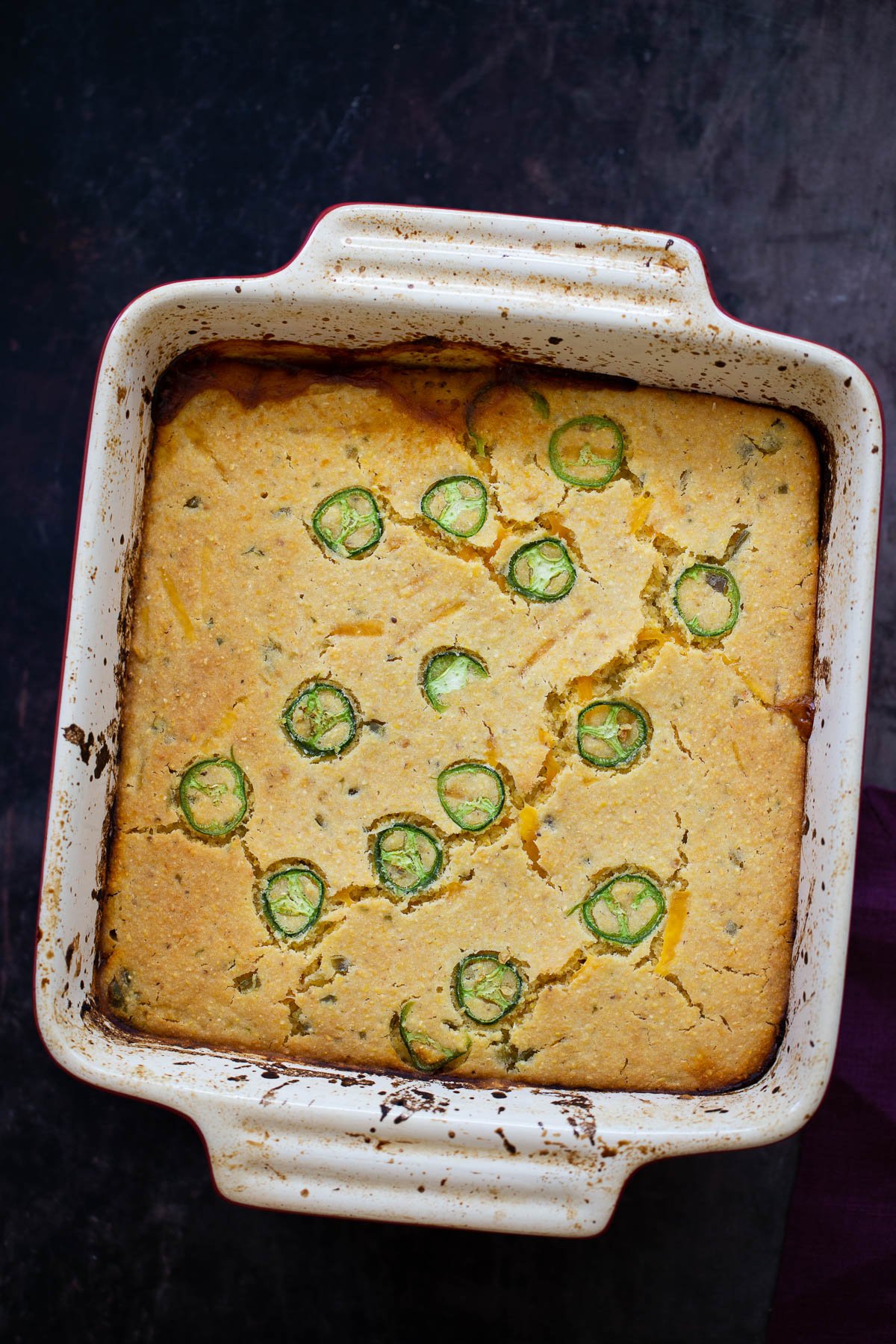 chilo cornbread casserole overhead shot of a casserole dish with chili cornbread casserole