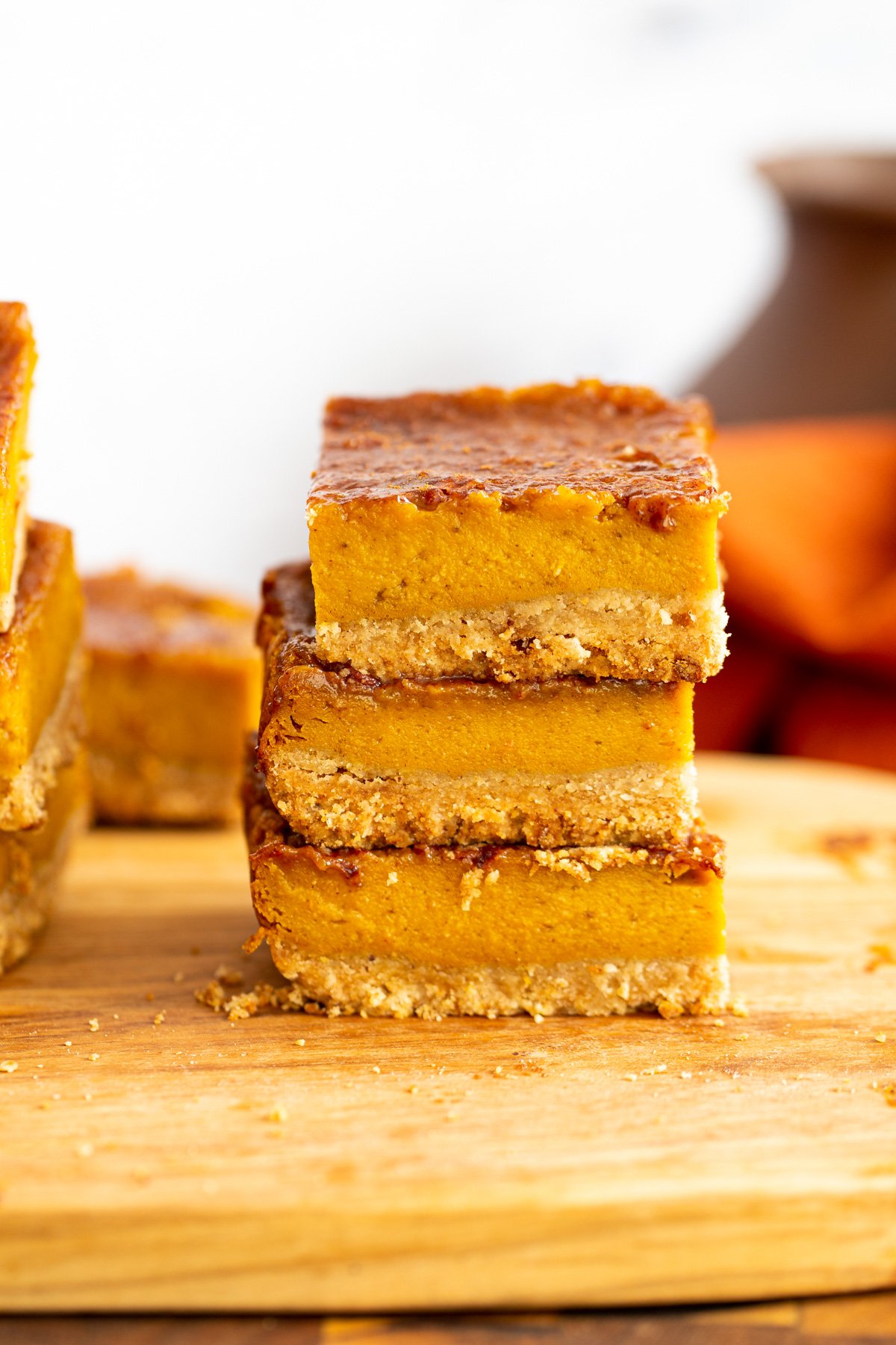 vegan pumpkin pie bars stacked vegan pumpkin pie bars