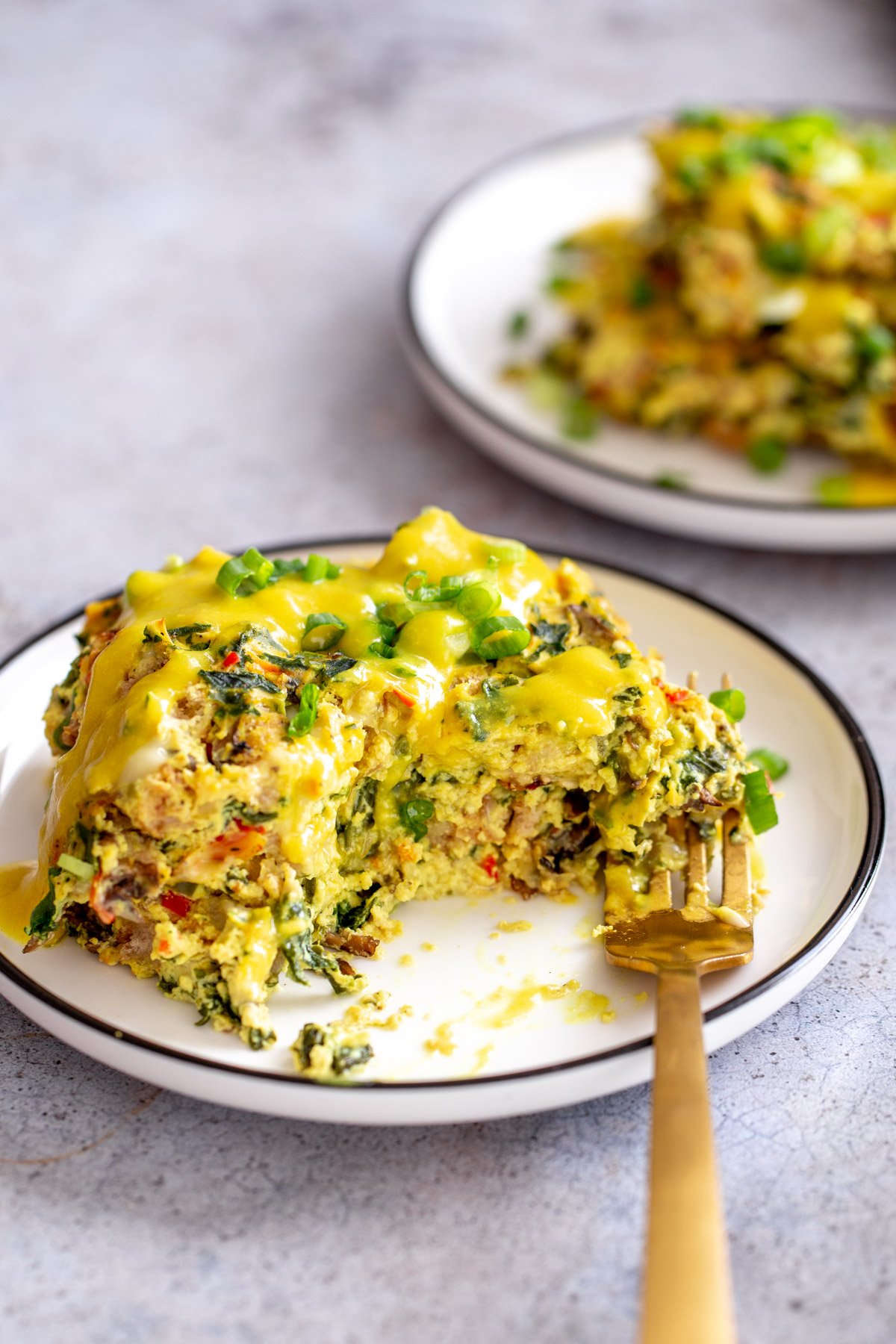 vegan egg casserole vegan egg casserole on a small plate served with vegan hollandaise sauce