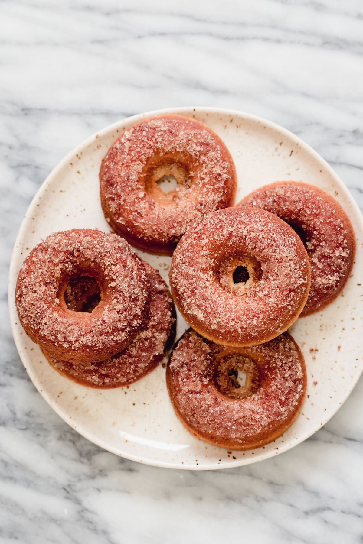 glutenfree donuts recipe  a plate with glutenfree donuts coated in cinnamon sugar