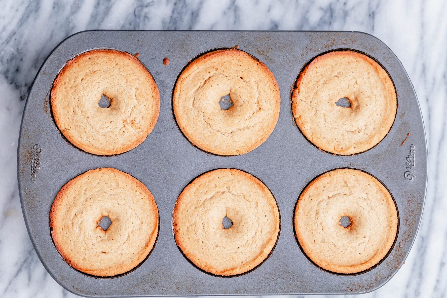 glutenfree donuts recipe freshly baked glutenfree donuts in a baking pan