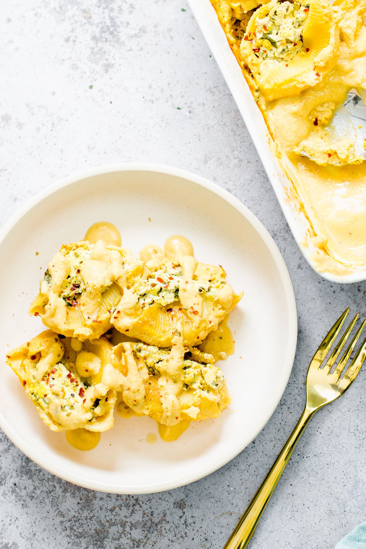 vegan stuffed shells overhead shot of vegan stuffed shells with butternut squash, spinach and vegan ricotta