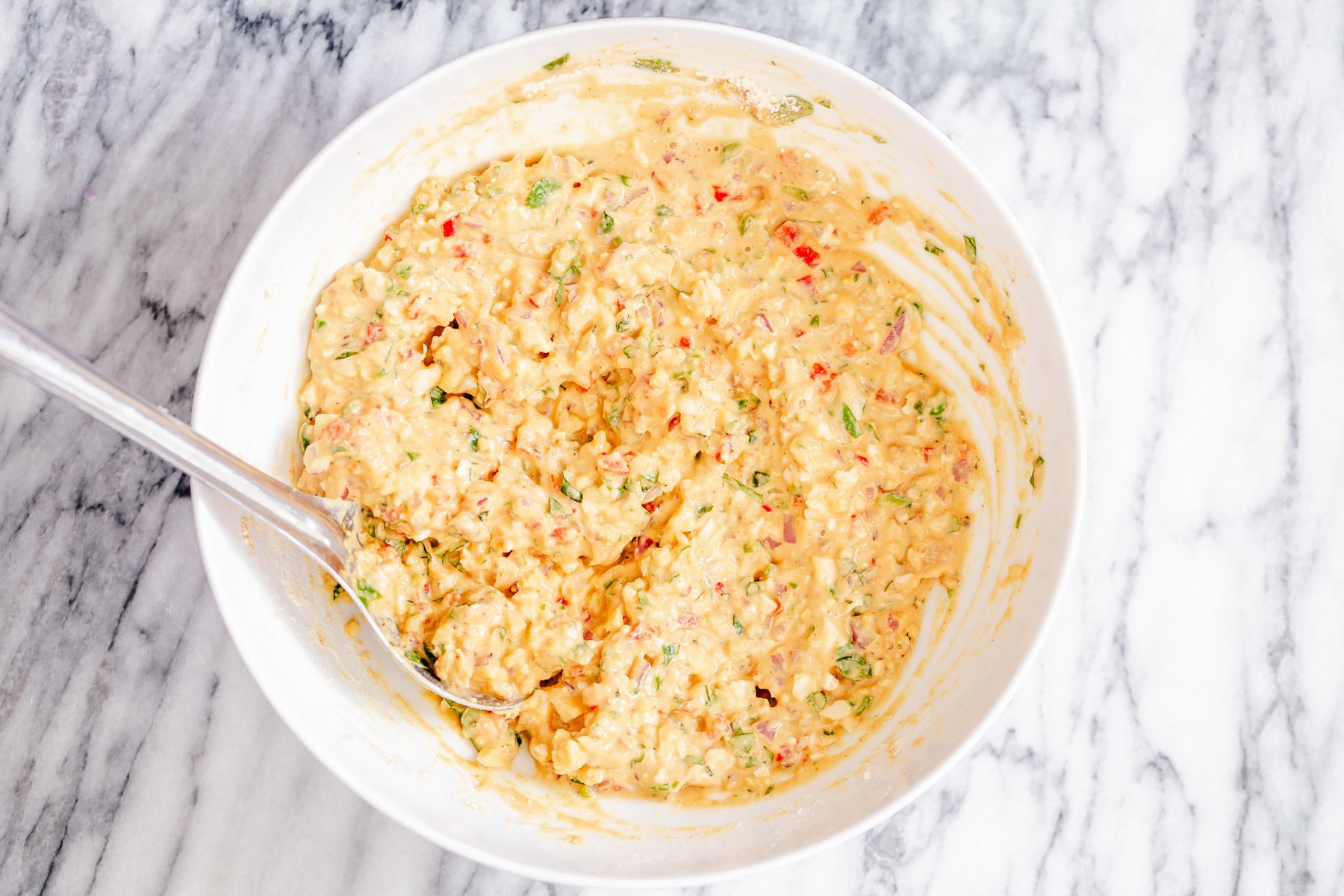 pakora waffle batter resting in a bowl