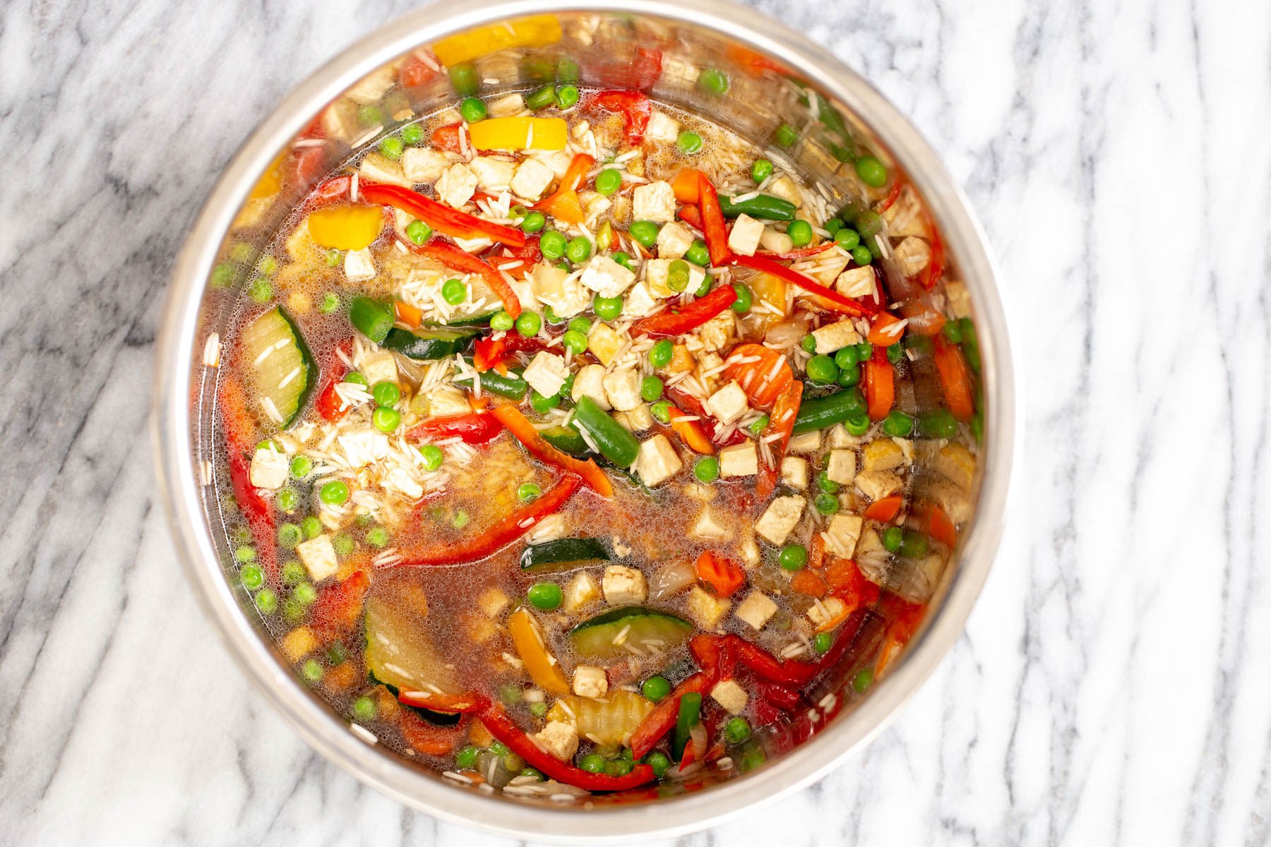 ingredients for Vegan Teriyaki Fried Rice being mixed in an Instant Pot