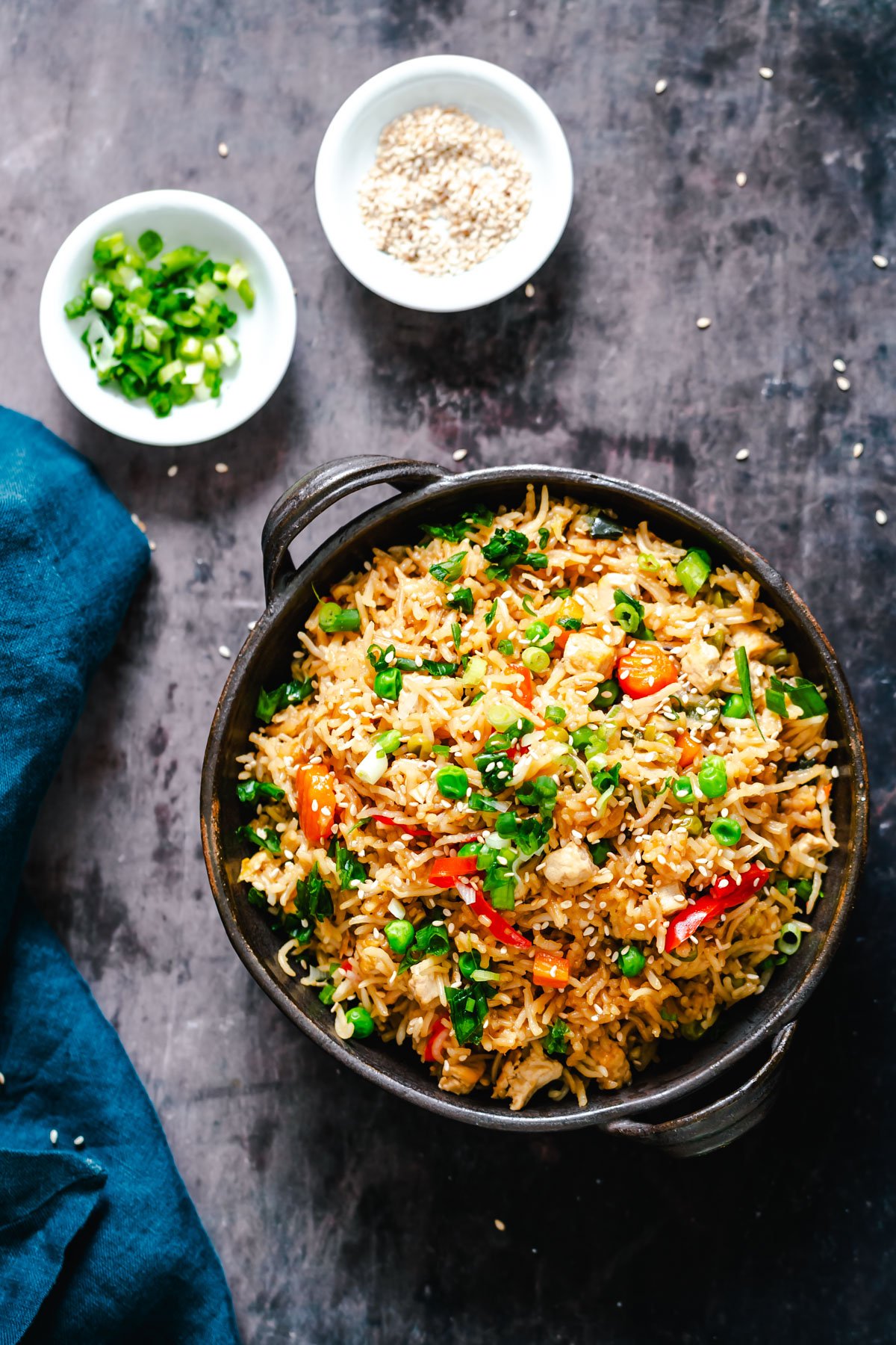 teriyaki fried rice overhead shot it a bowl with vegan instant pot teriyaki fried rice topped with green onions and sesame seeds
