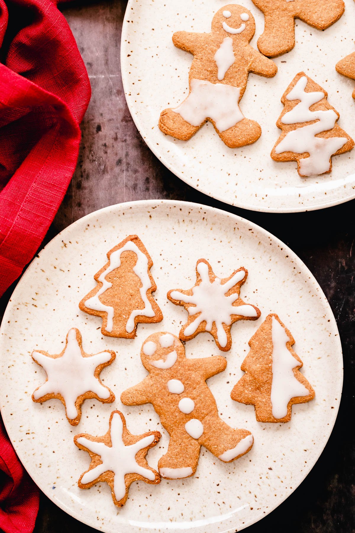 vegan gingerbread cookies two plates with iced glutenfree vegan gingerbread cookies