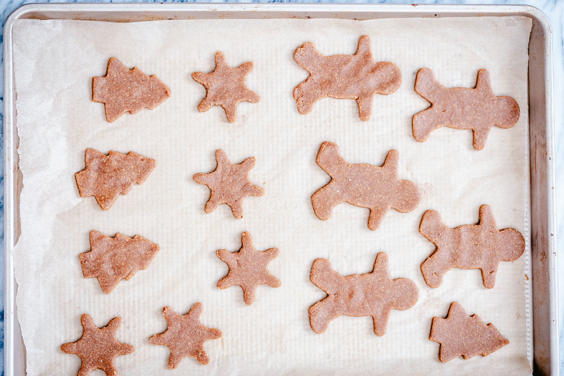 vegan gingerbread cookies  a cookie tray with vegan gingerbread cookies