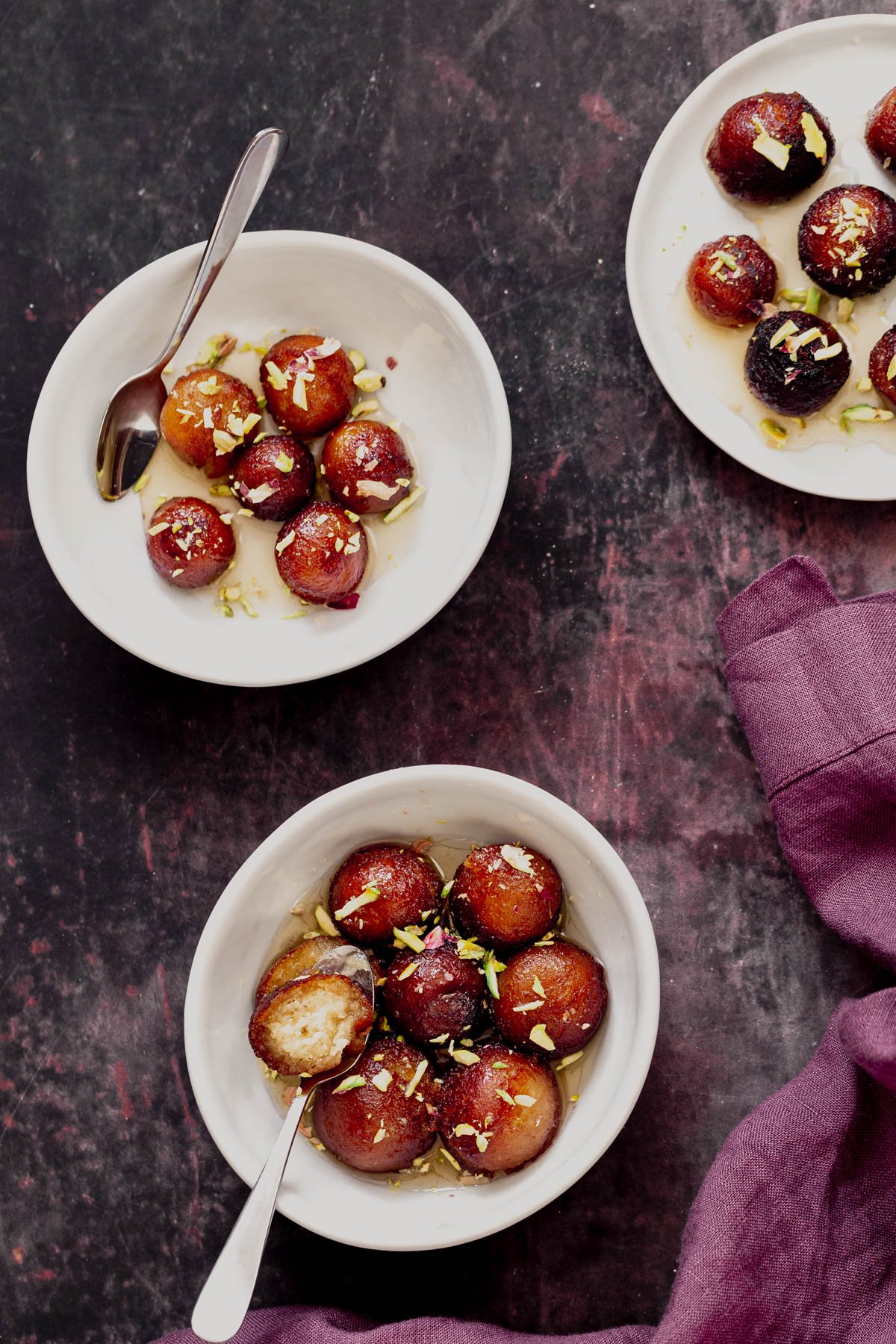 overhead shot of vegan gulab jamuns made from diy donut mix
