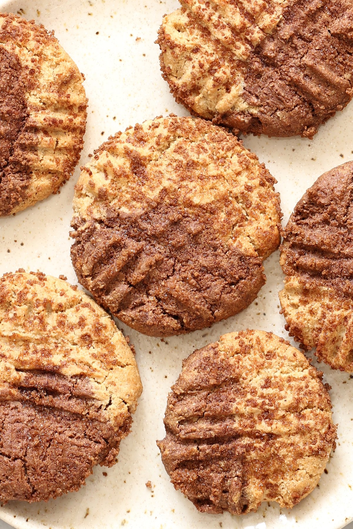 a plate with vegan pumpkin spice snickerdoodle cookies