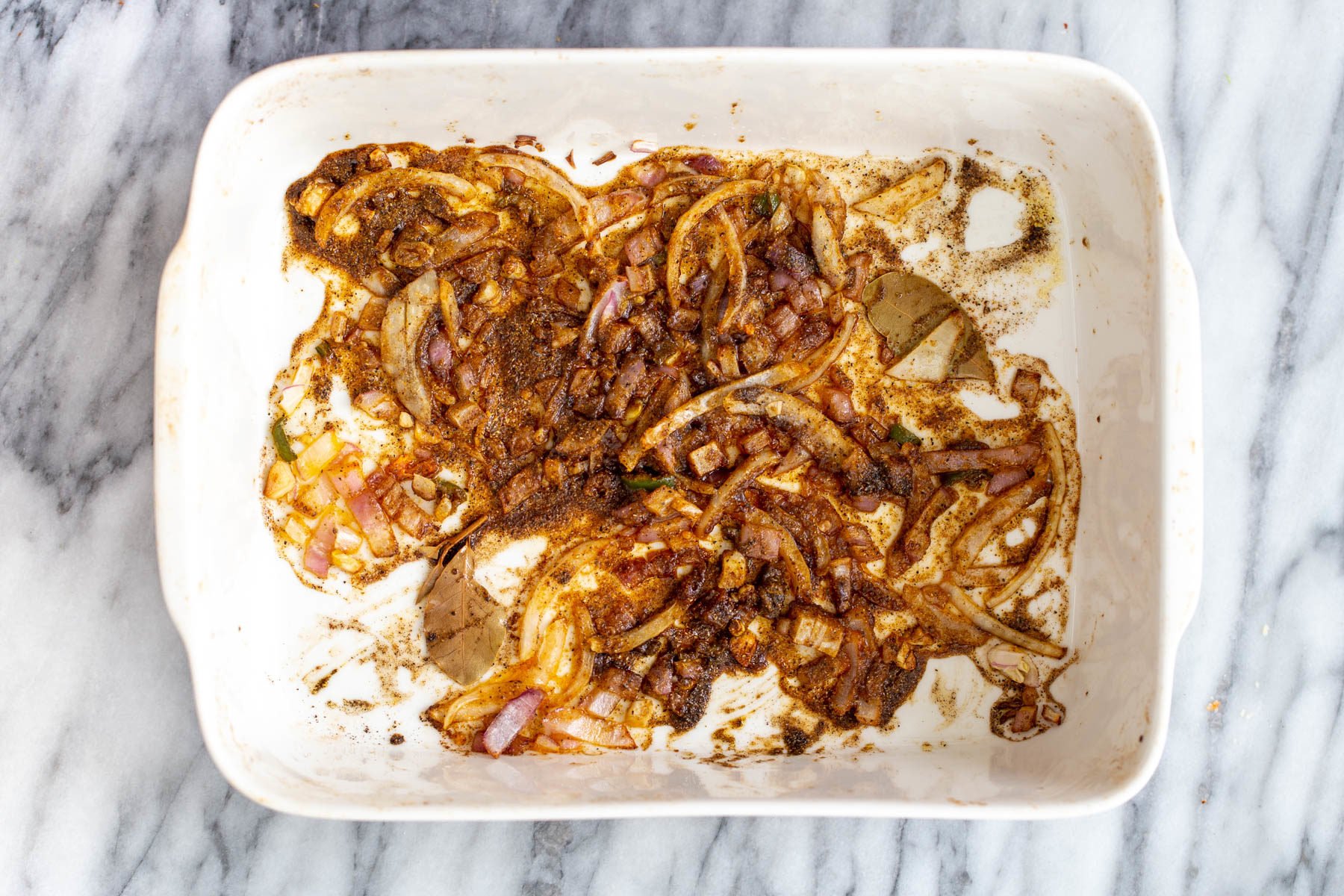 Indian vegetable casserole onion, garlic and Indian spices baked in a casserole dish until golden brown