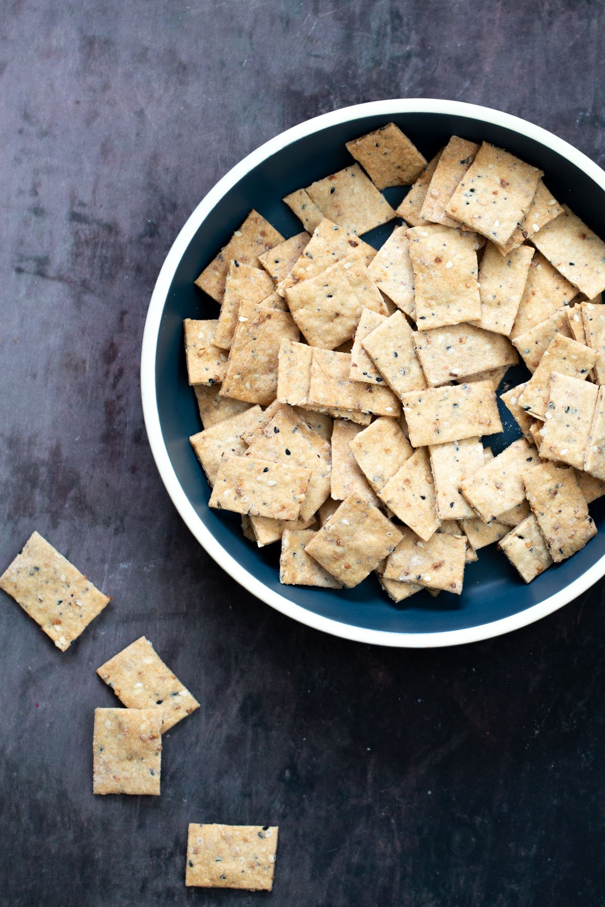 Everything Bagel Crackers a bowl with vegan Everything But the Bagel Crackers