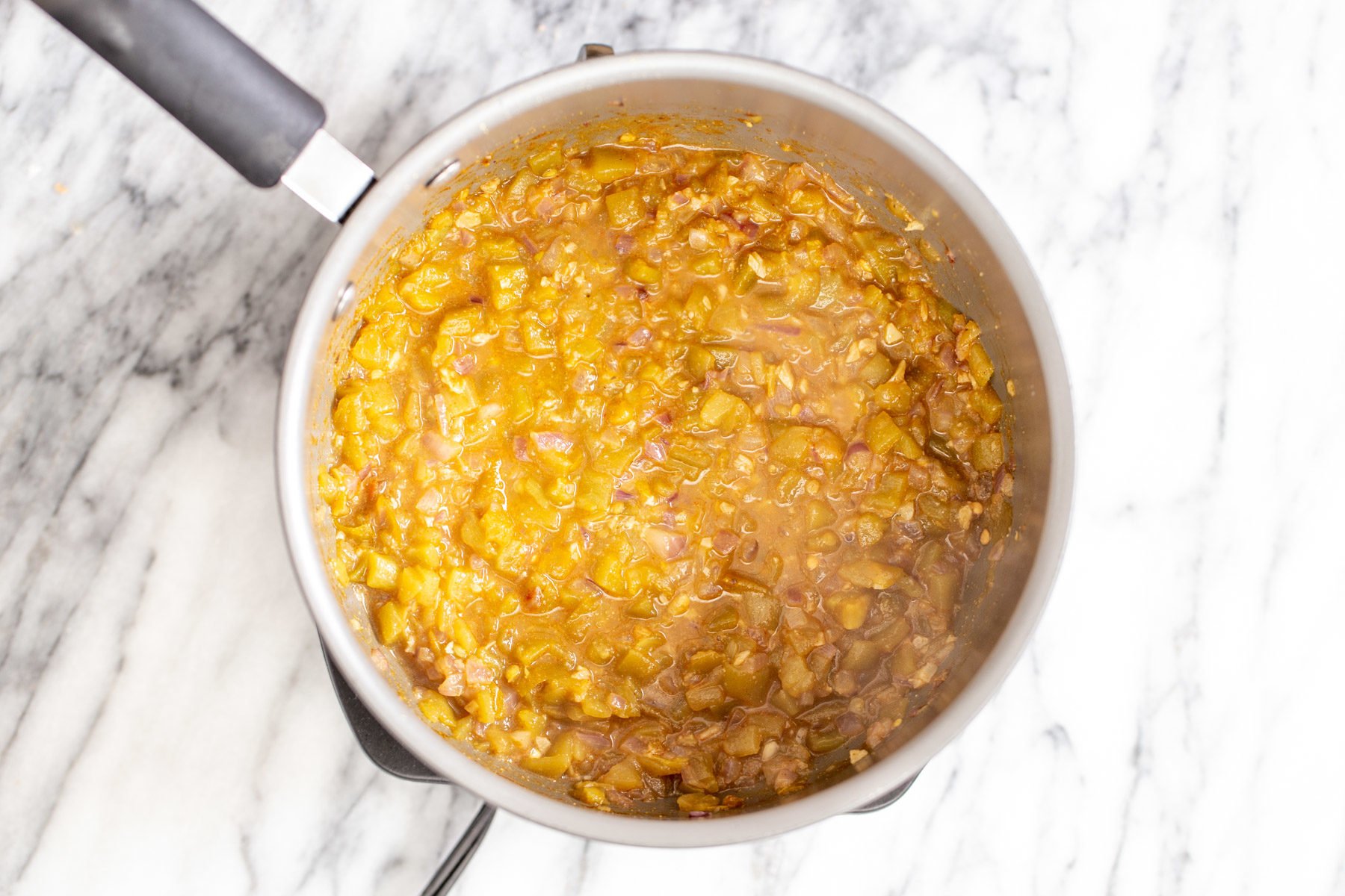 vegan enchilada soup  vegan enchilada soup cooking in a sauce pan