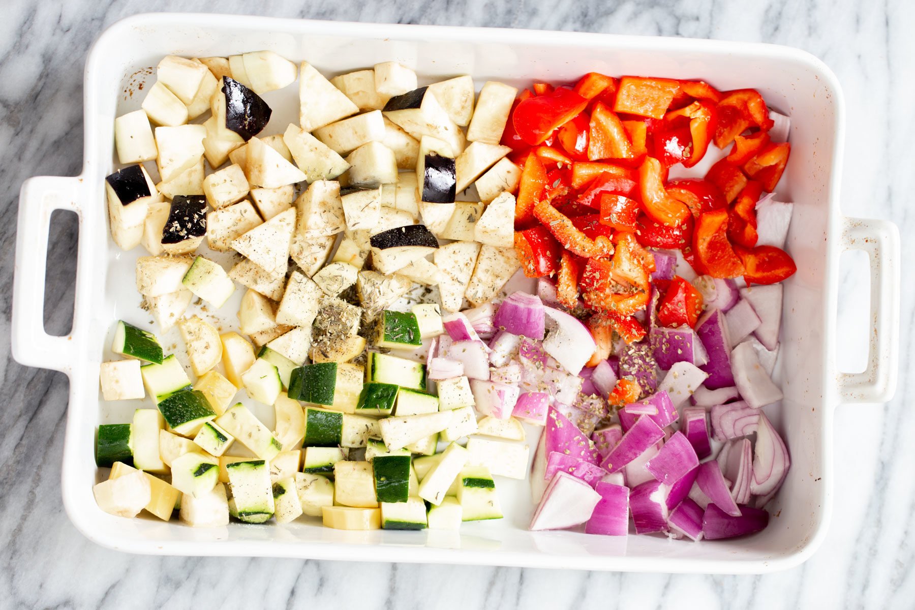 veggies for baked ratatouille in a casserole dish