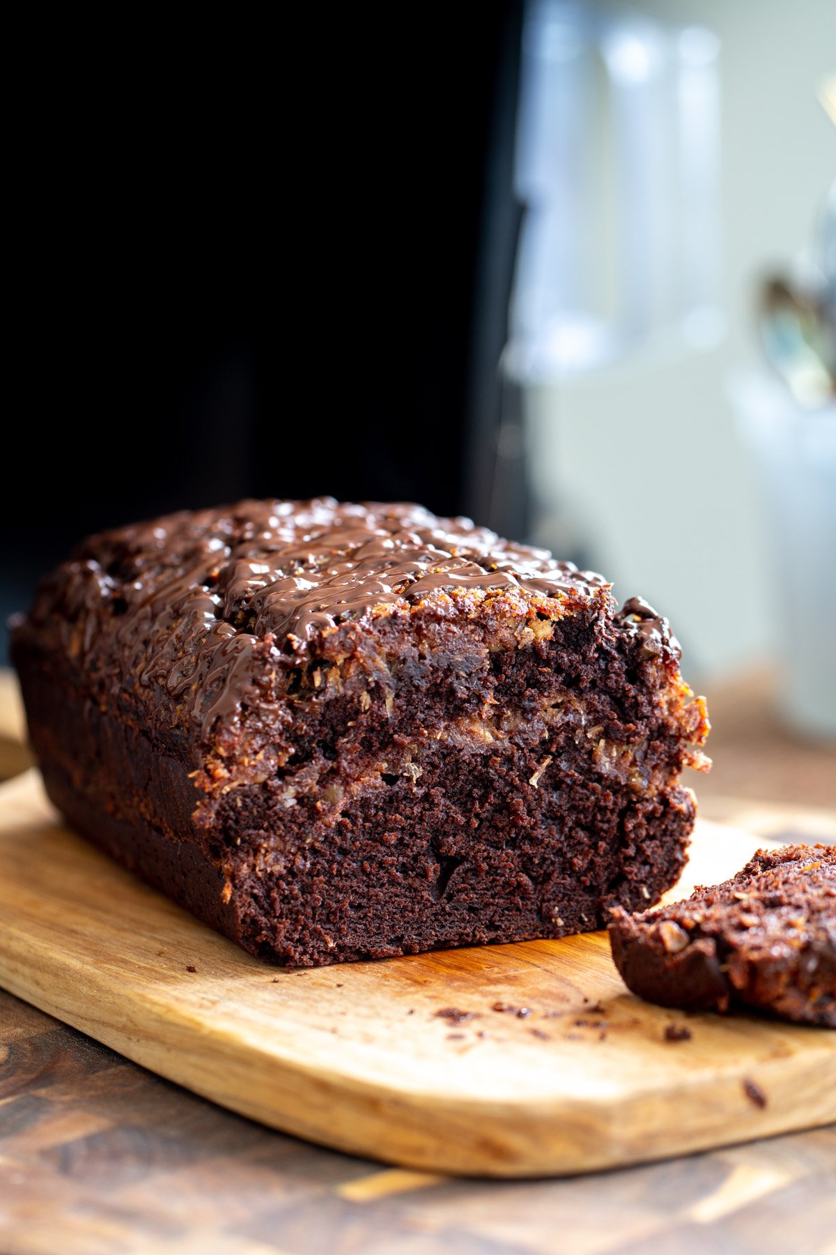 German Chocolate Loaf Cake Vegan German chocolate loaf cake with one slice cut
