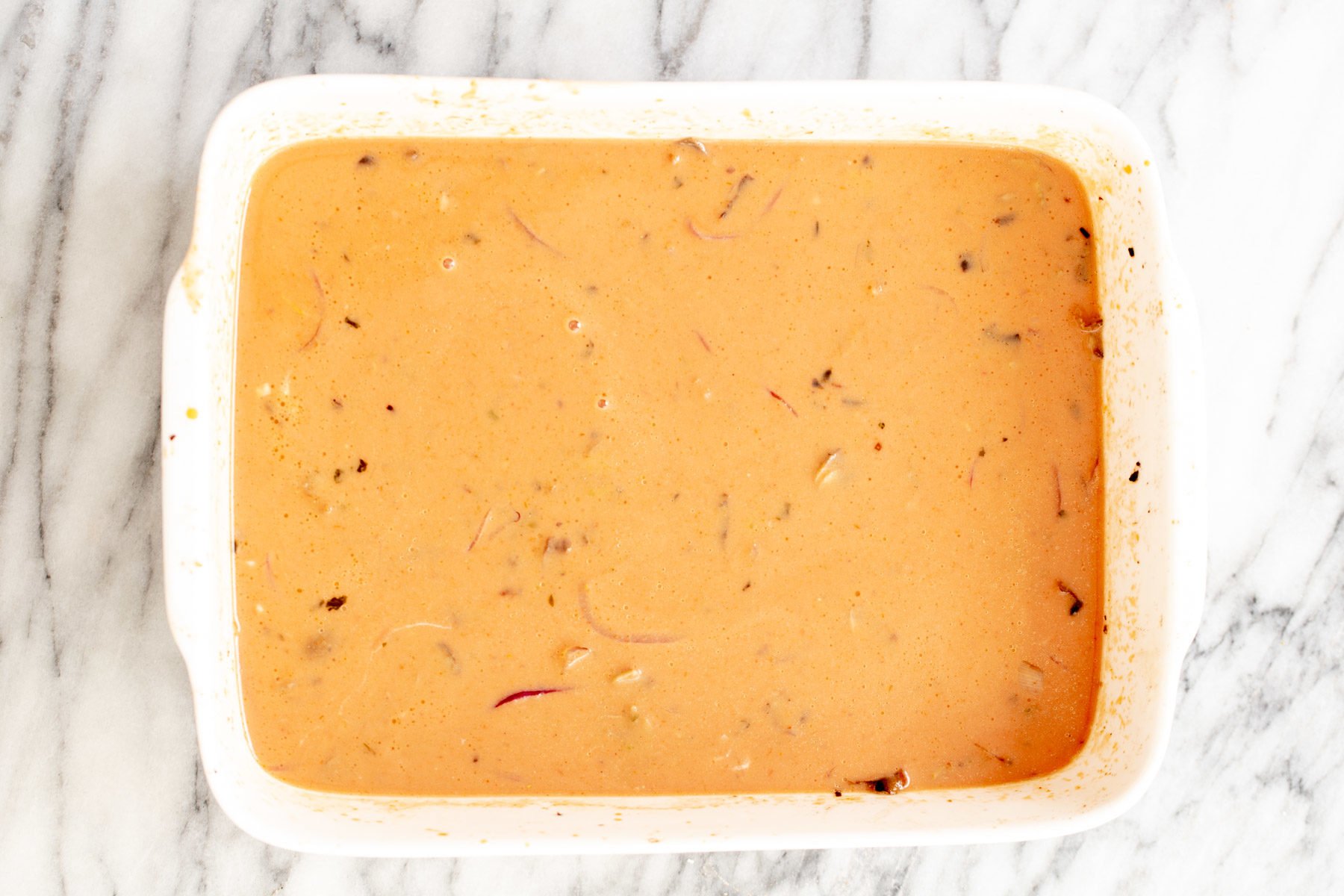 vegan butter chicken lasagna ready to be baked