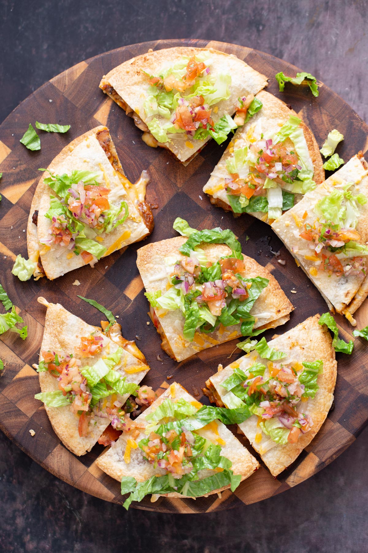 vegan tostadas vegan mushroom tostadillas served topped with salsa and romaine on a wooden chopping board