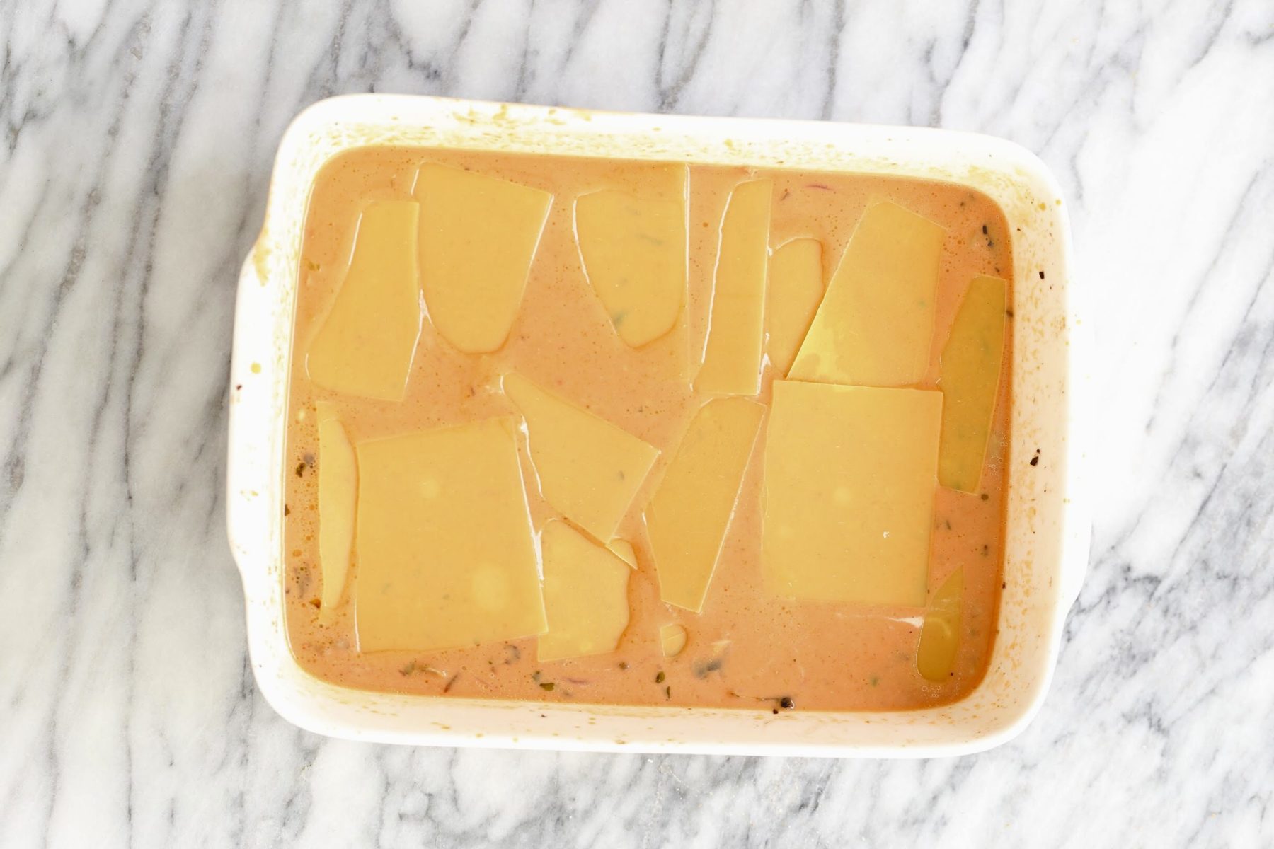vegan butter chicken lasagna ready to be baked