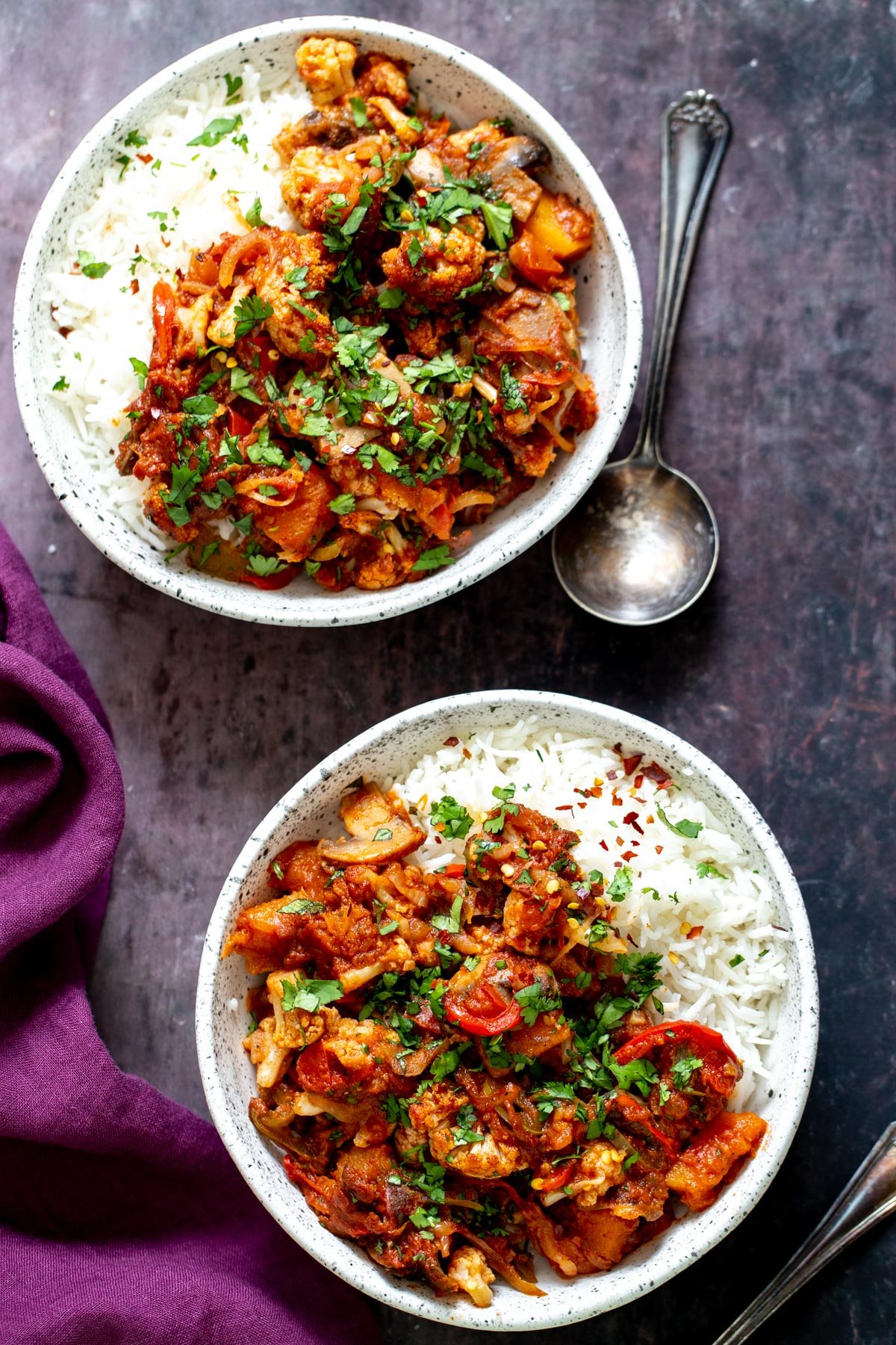 vegetable balti  overhead shot of two servings of vegetable balti served with rice