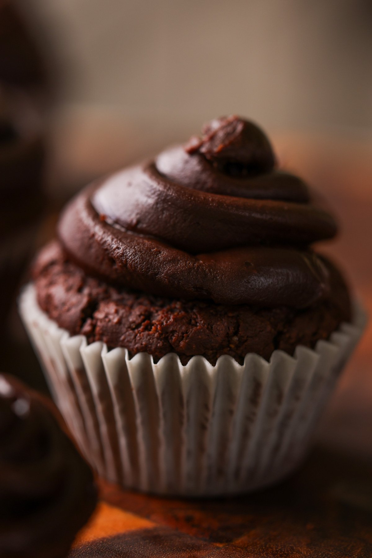vegan gluten-free chocolate cupcake after frosting