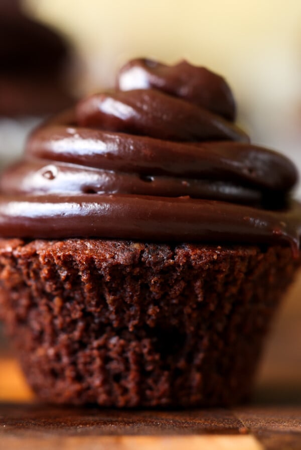 vegan gluten-free chocolate cupcake on a wooden table