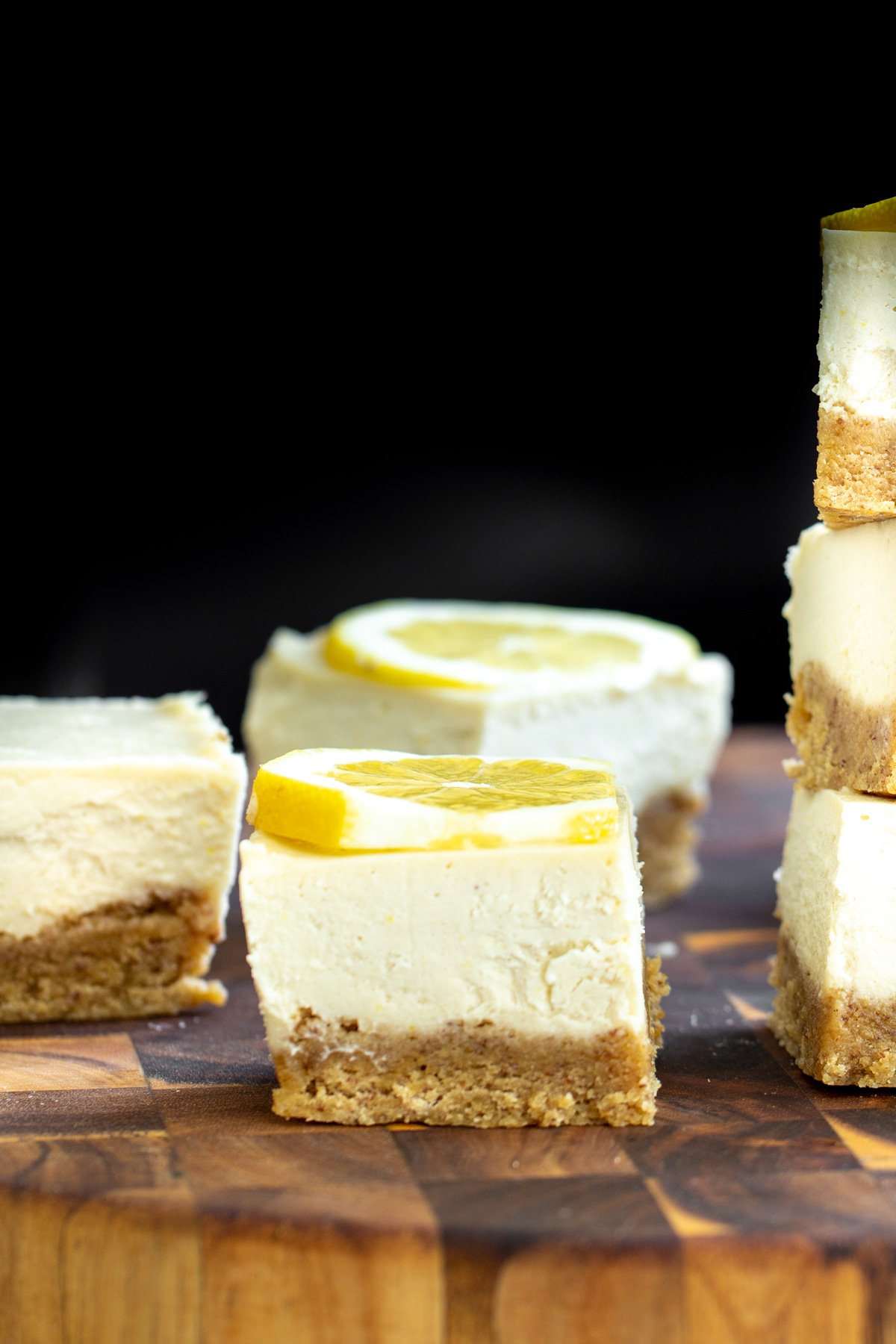 vegan lemon bars  vegan lemon bars with glutenfree crust on a wooden chopping board