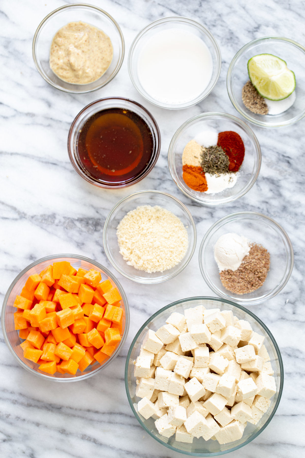 overhead shot of ingredients needed for sweet potato tofu bowls