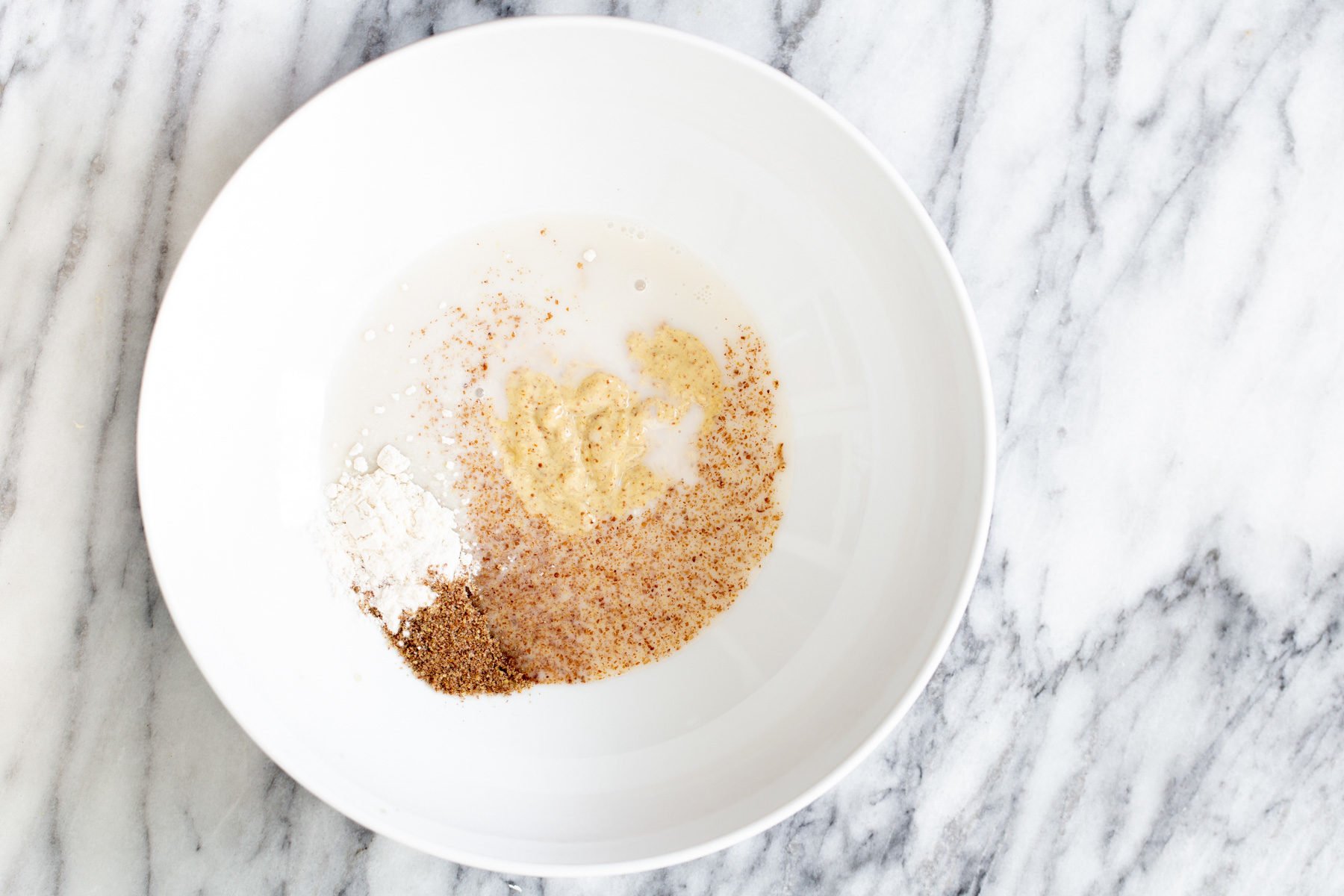 seasoning for tofu marinade in a small bowl