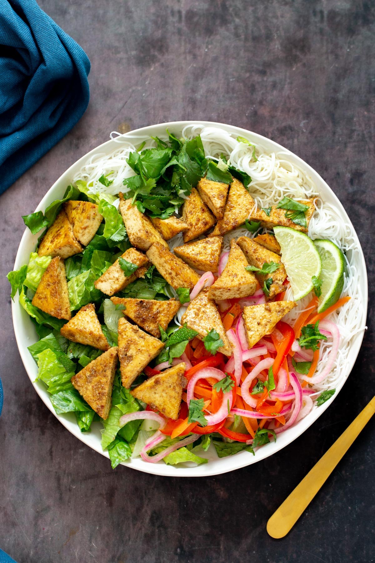 tofu noodle bowls overhead shot of Vietnamese curried noodle bowls decorated with fresh herbs