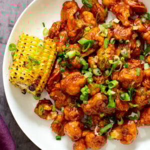 beer battered baked bbq wings covered with bbq sauce
