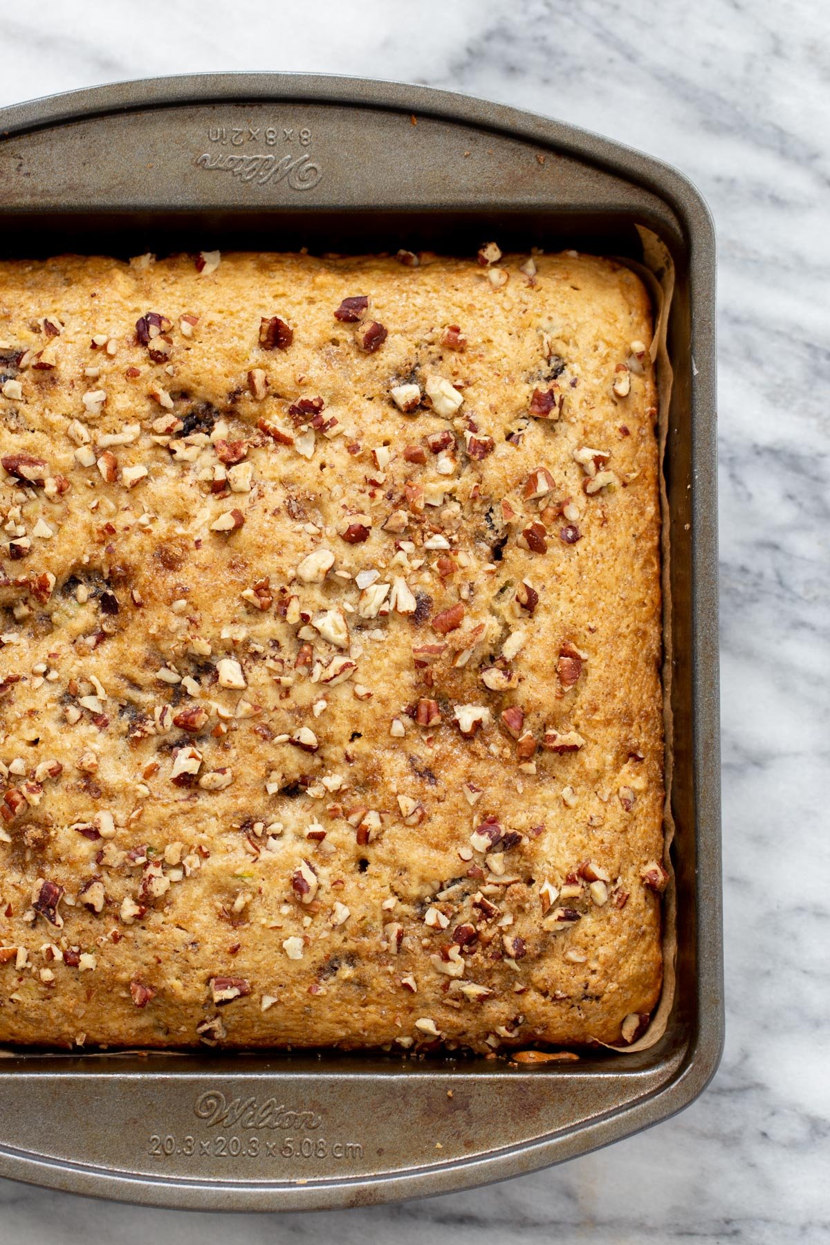 date nut cake  freshly baked vegan date nut cake in a cake pan