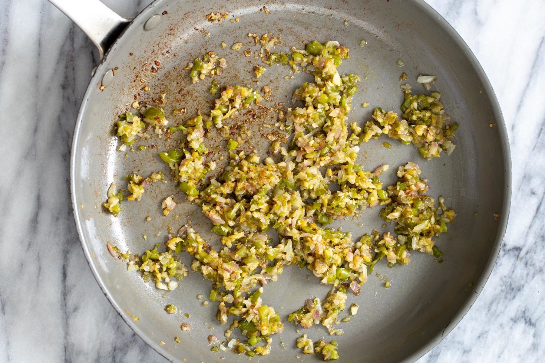 finely minced sauteed ginger, chili, garlic and onions in a pan