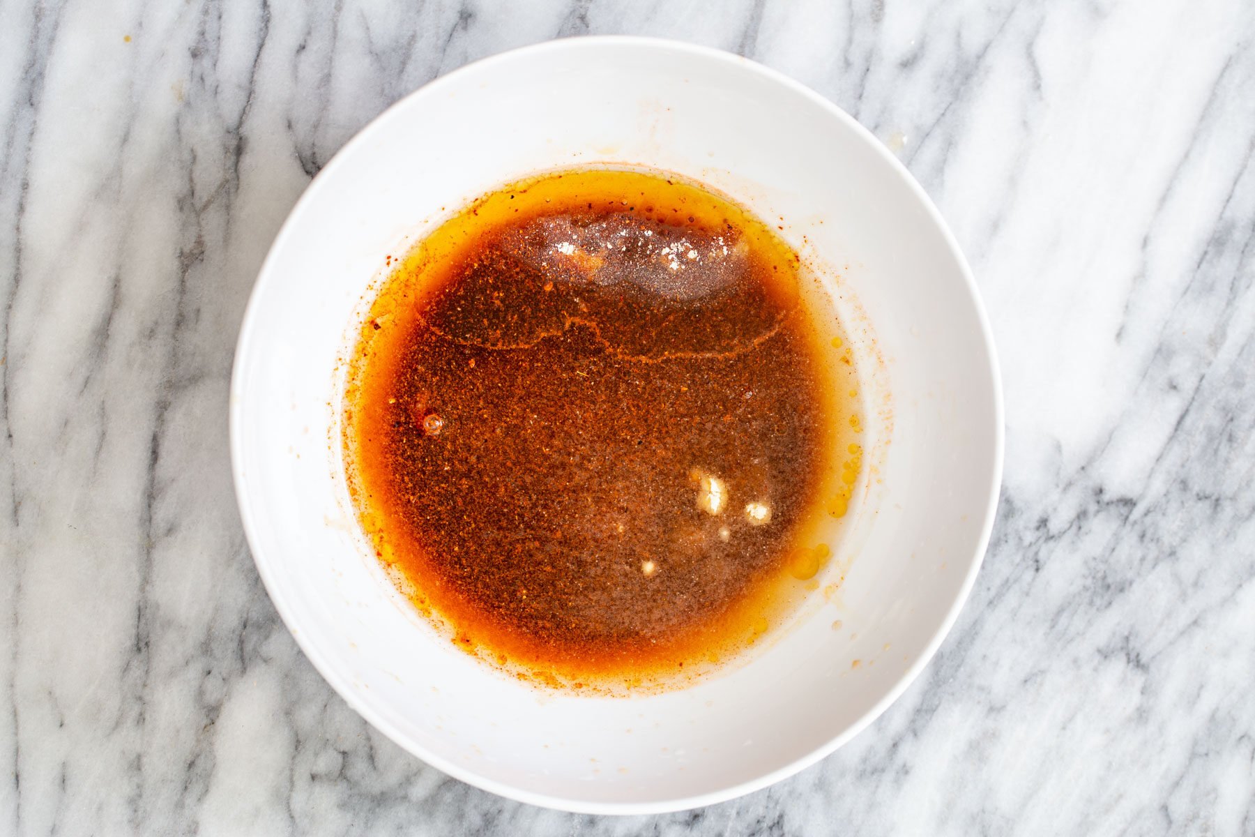 Korean Gochujang marinade in a white bowl