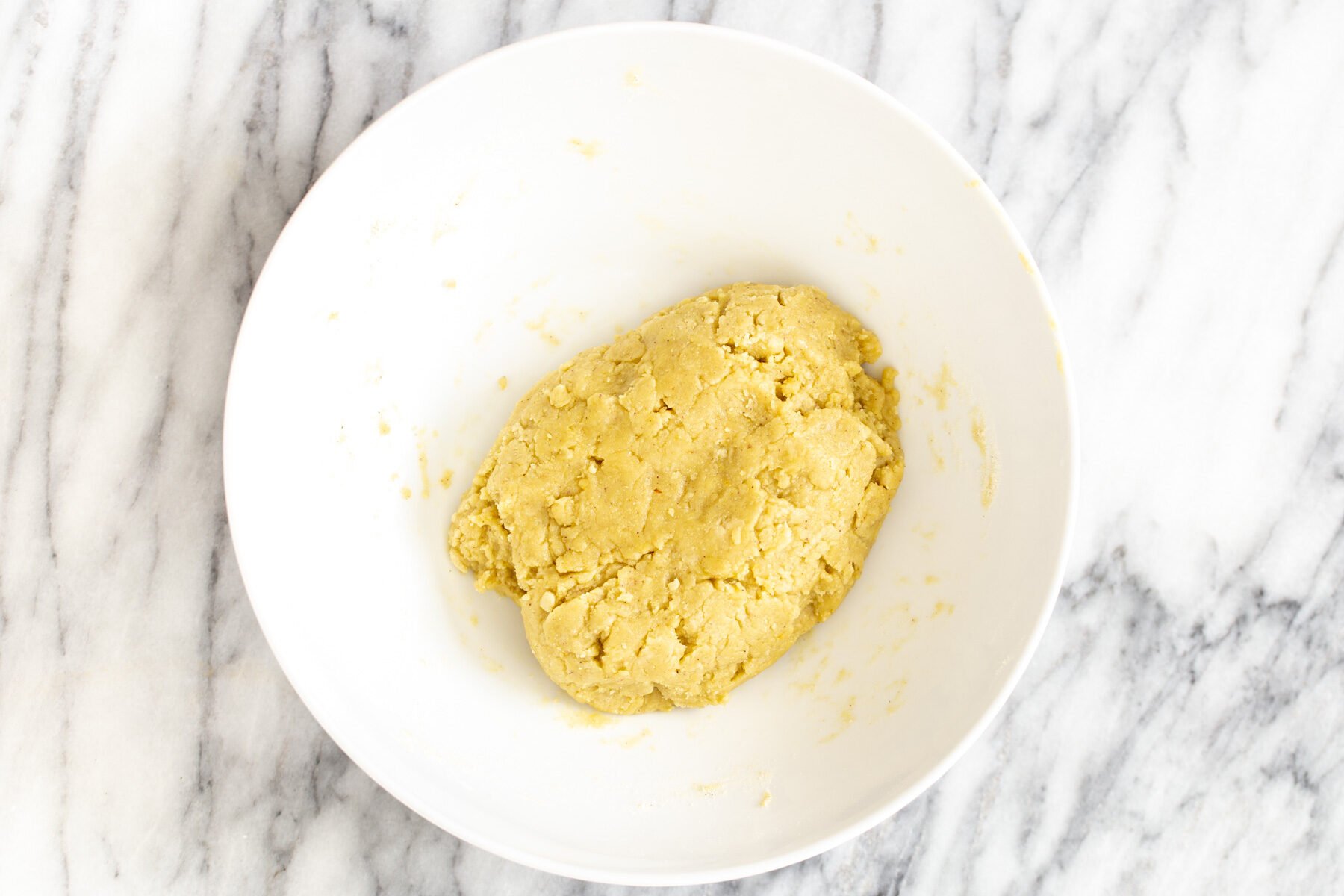 pistachio cookies vegan pistachio cookie batter in a white bowl