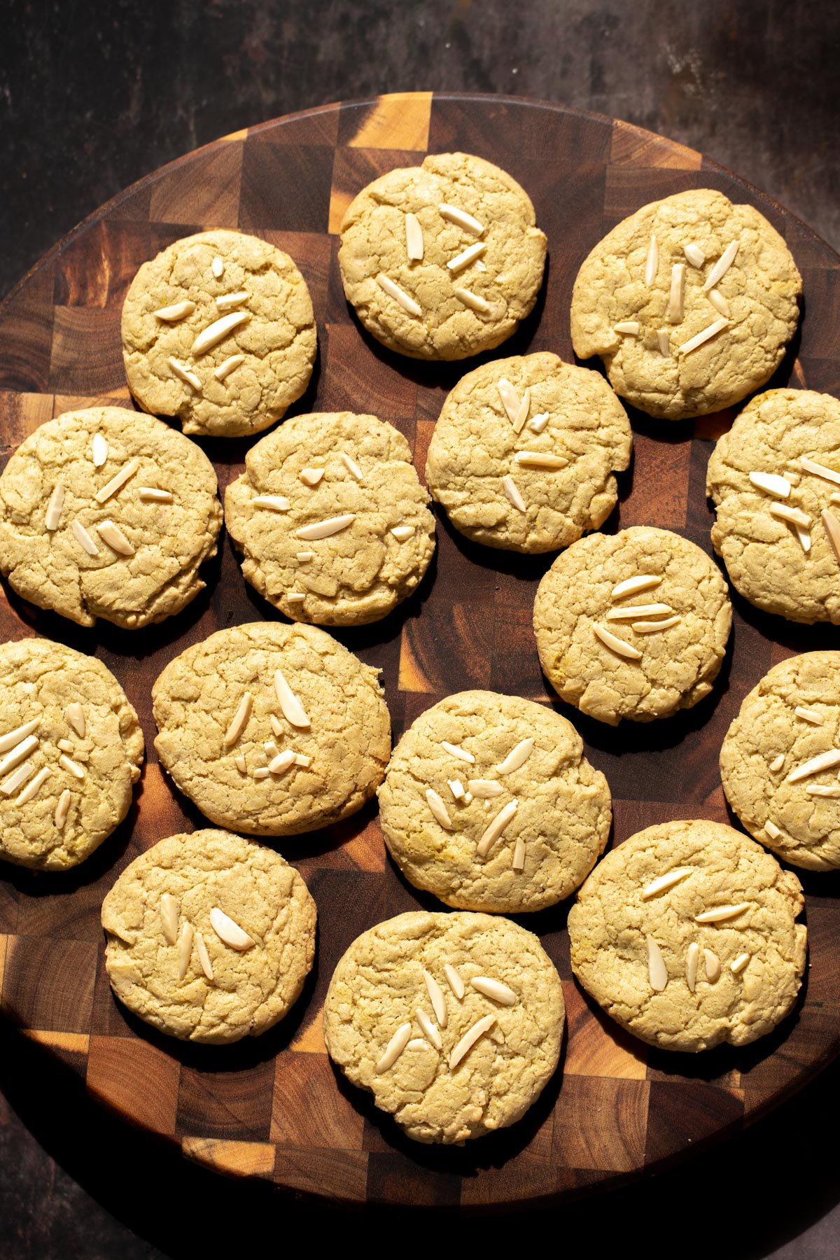 pistachio cookies vegan pistachio cookies decorated with almond slivers on a wooden board