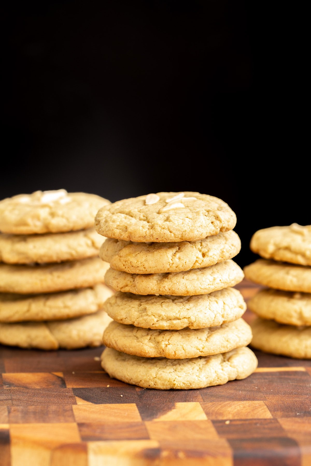 pistachio cookies stacked vegan pistachio cookies on a wooden board