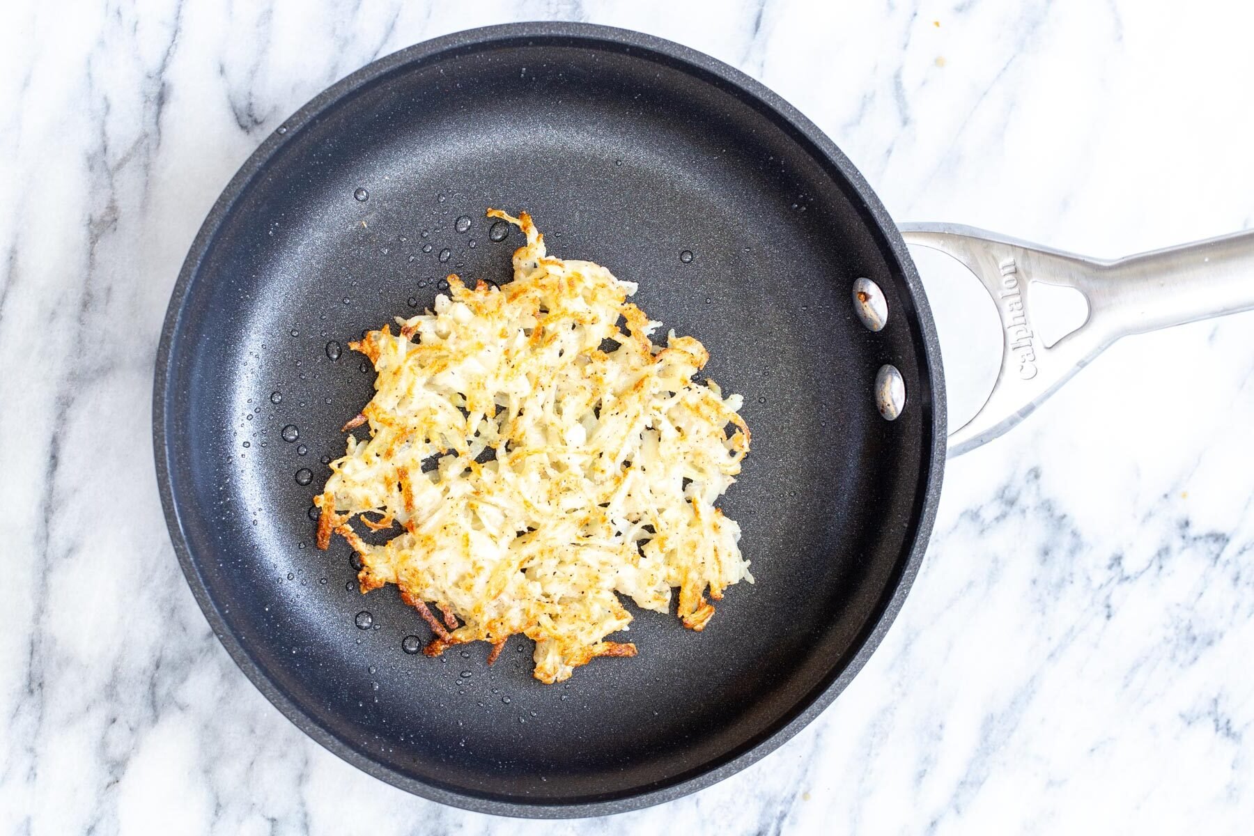 chickpea breakfast  vegan hash brown in a sauteeing pan