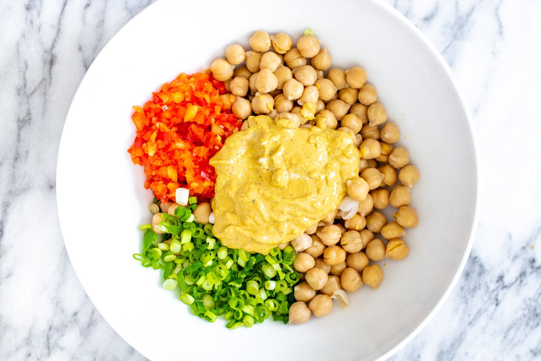 chickpea breakfast  ingredients for vegan chickpea scramble in a white bowl