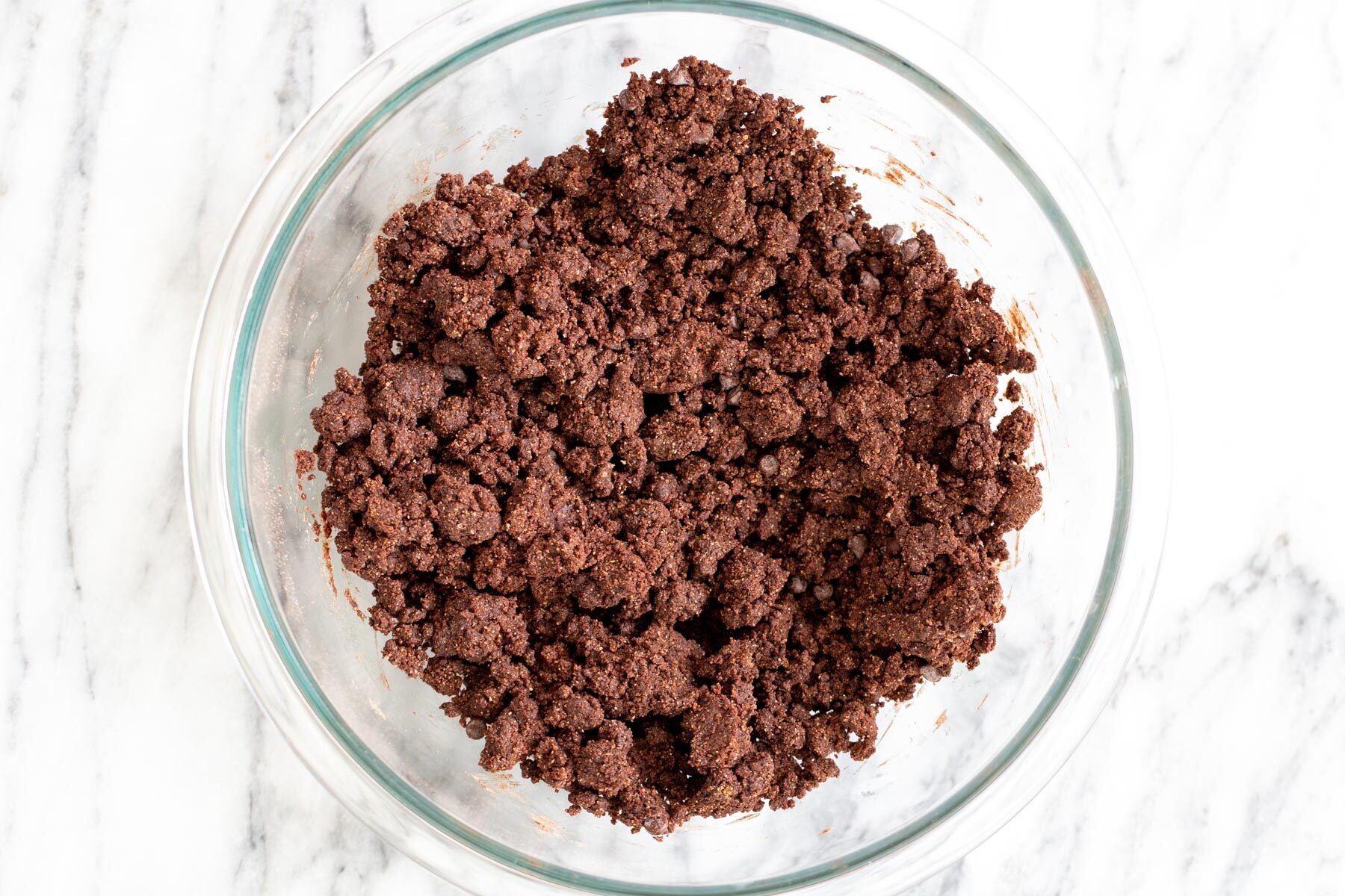 vegan chocolate cookie dough in a glass bowl