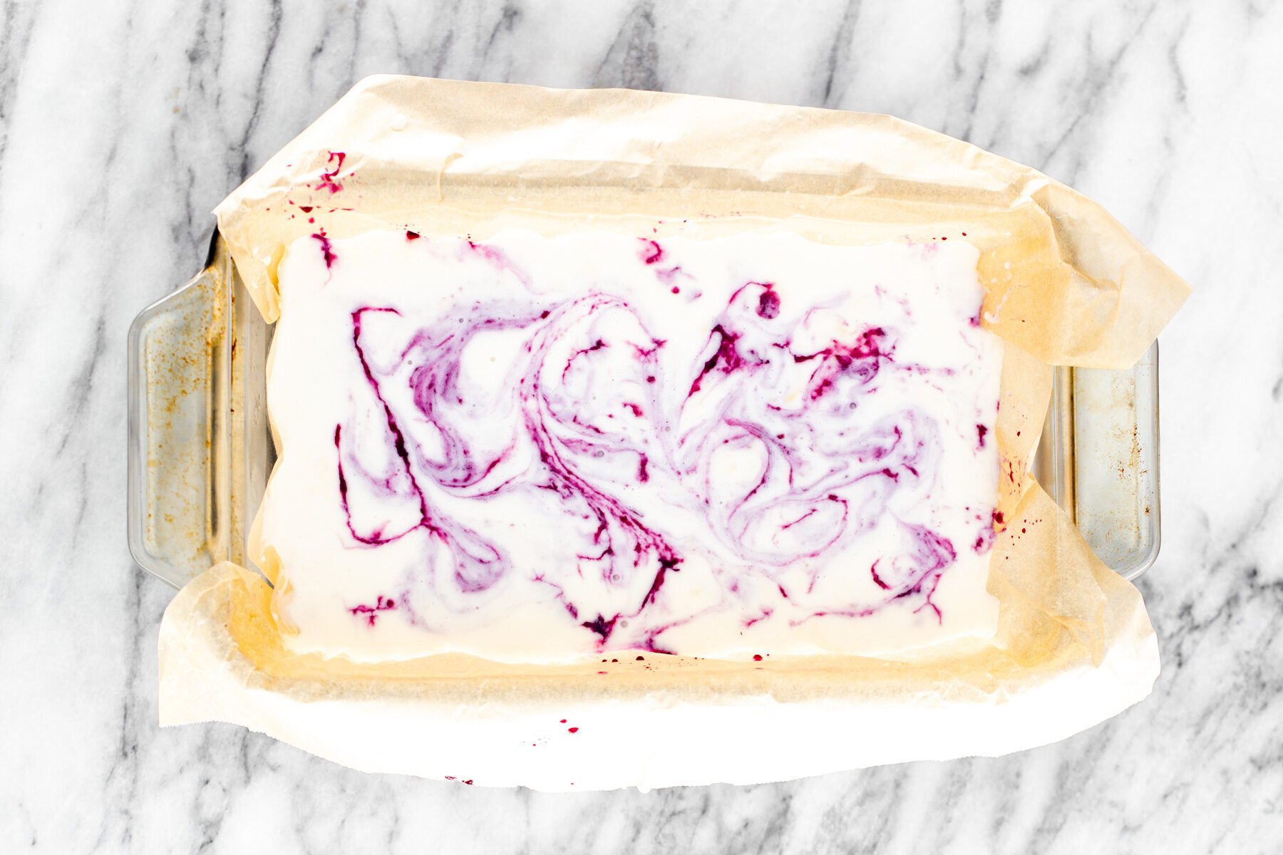 vanilla ice cream sandwiches  vanilla ice cream base in a loaf pan swirled with blueberry compote