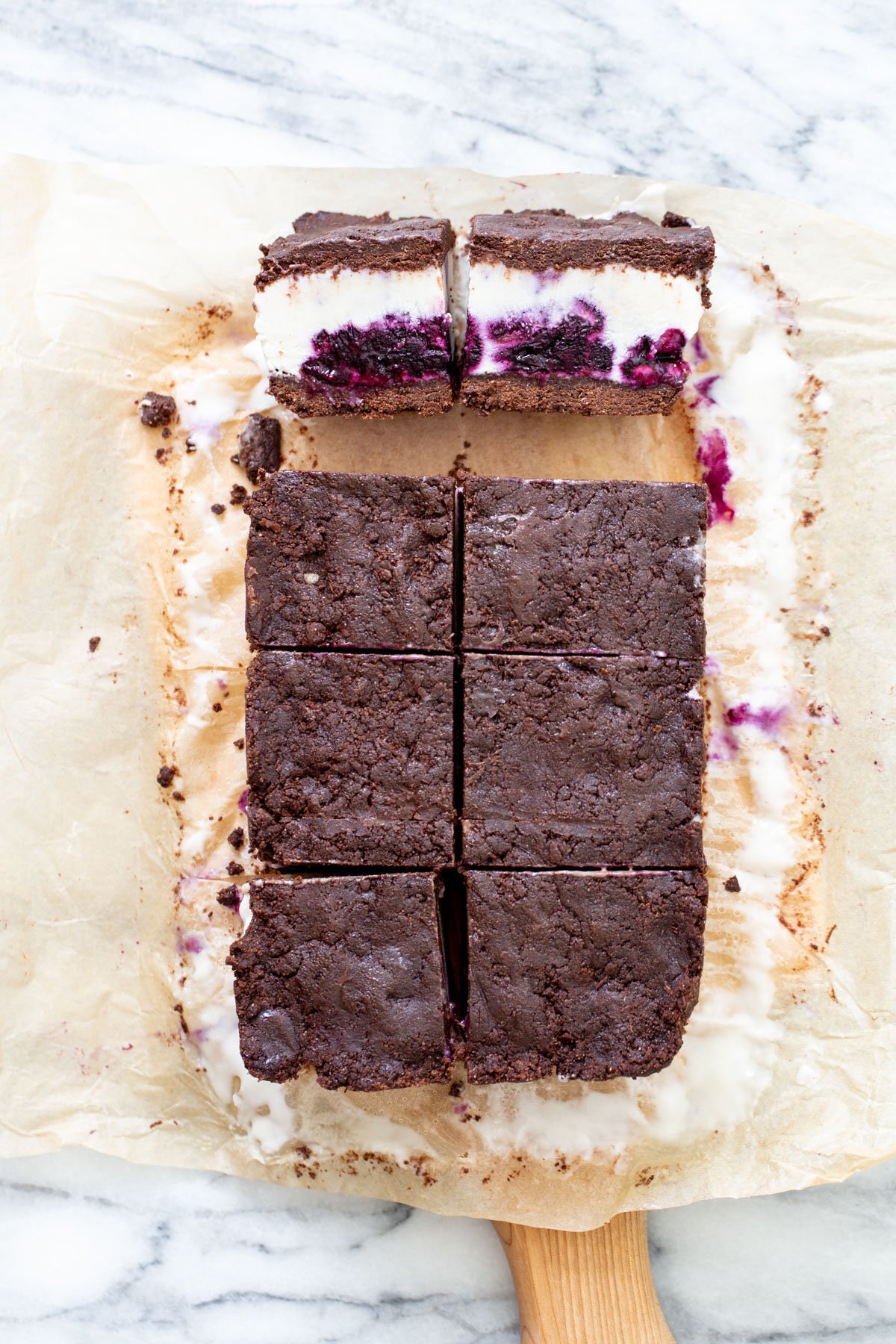 vegan vanilla ice cream sandwiches being cut into squares