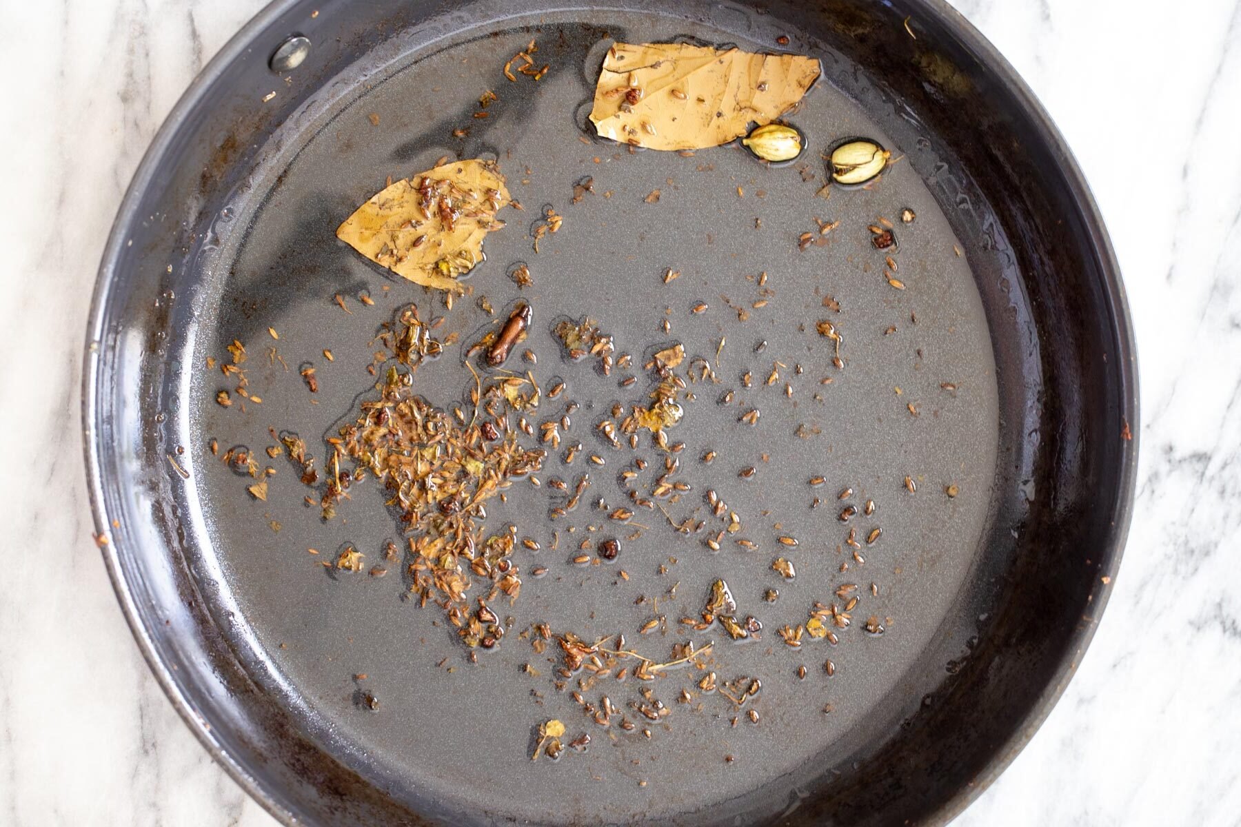 a sauteeing pan with spices