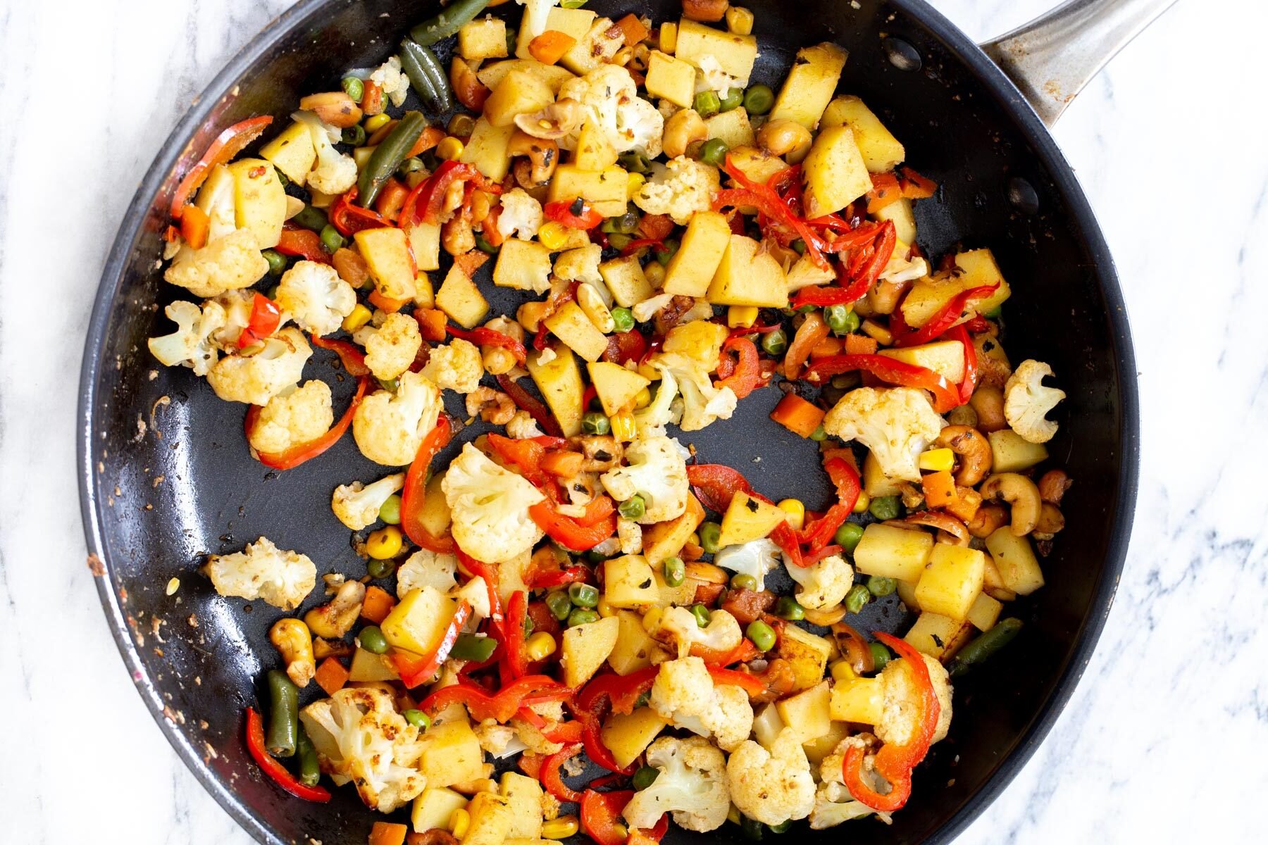 vegetables in a black frying pan